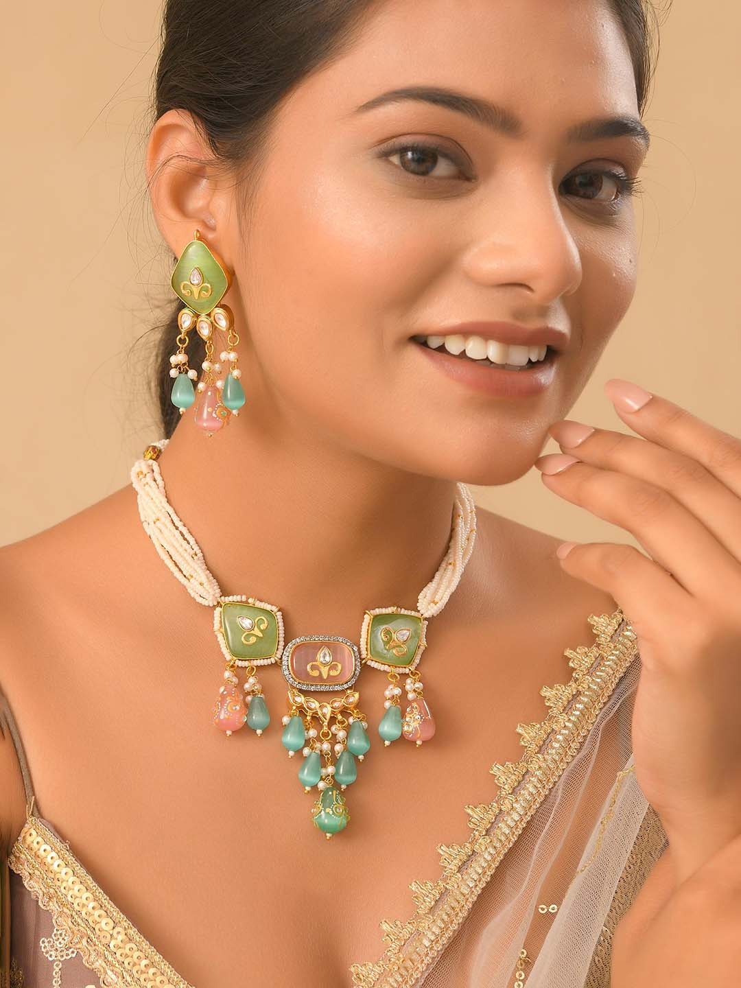 

DASTOOR Gold-Plated Kundan-Studded & Beaded Necklace & Earrings