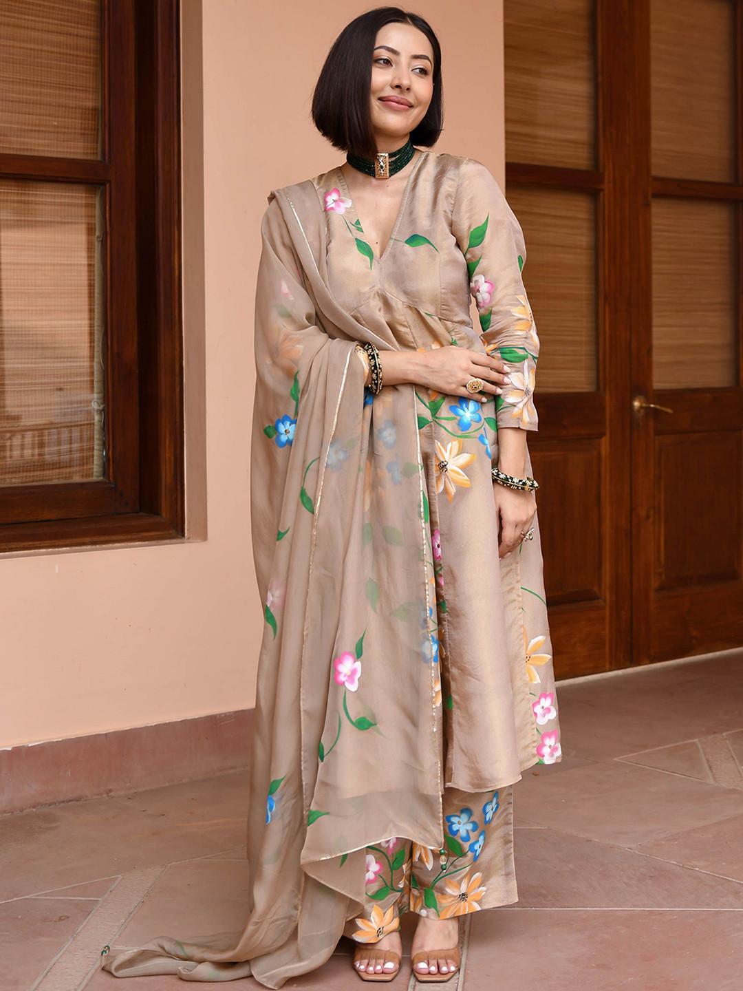 

Rangeelo Floral Printed V-Neck Empire Styled Straight Kurta With Palazzos & Dupatta, Brown