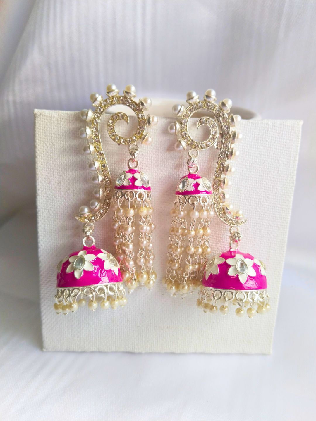 

Anouk Pink Gold Plated Kundan Dome Shape Meenakari Jhumkas