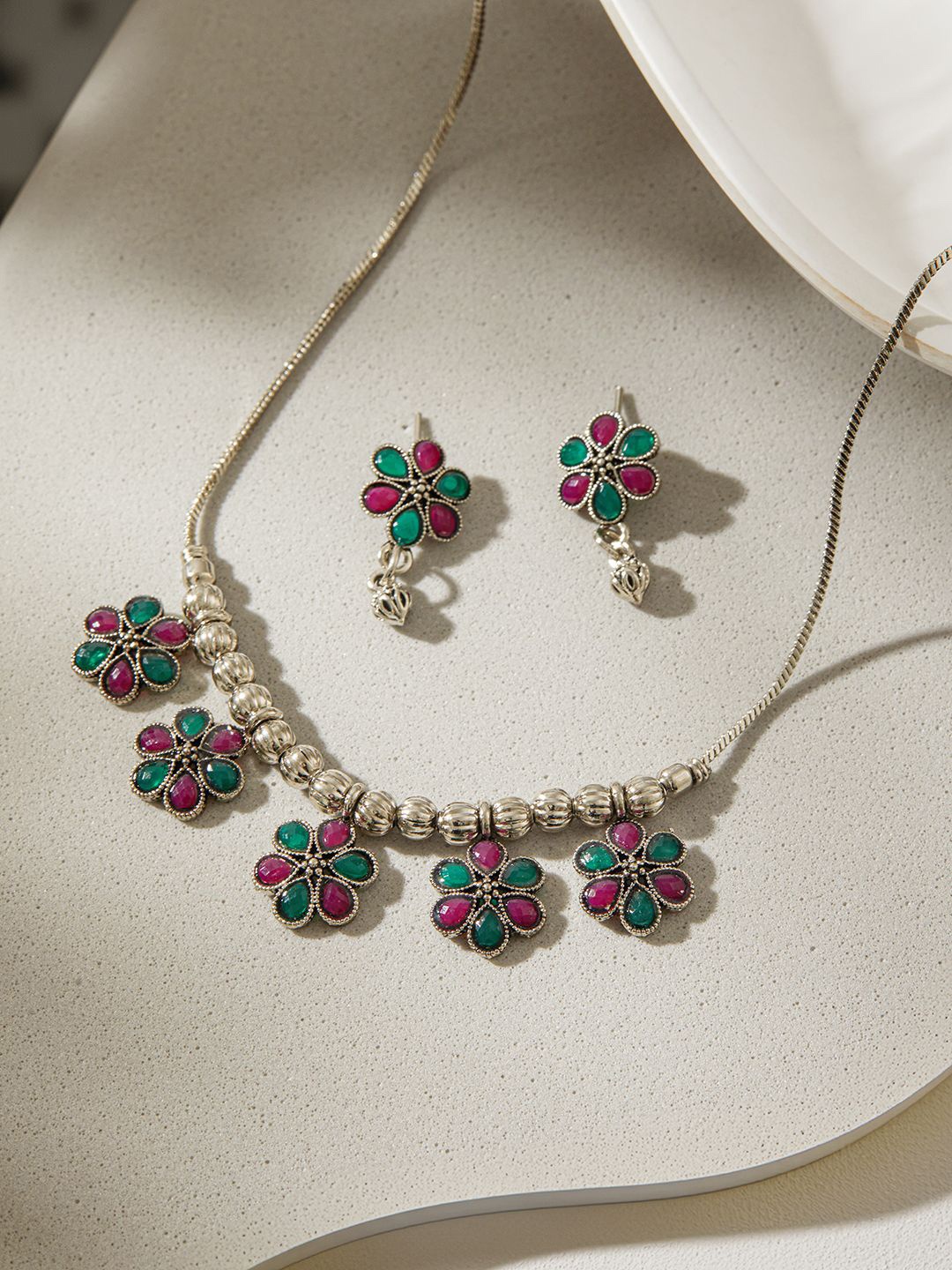 

Jazz and Sizzle Silver-Plated Oxidised Stone-Studded Floral Jewellery Set