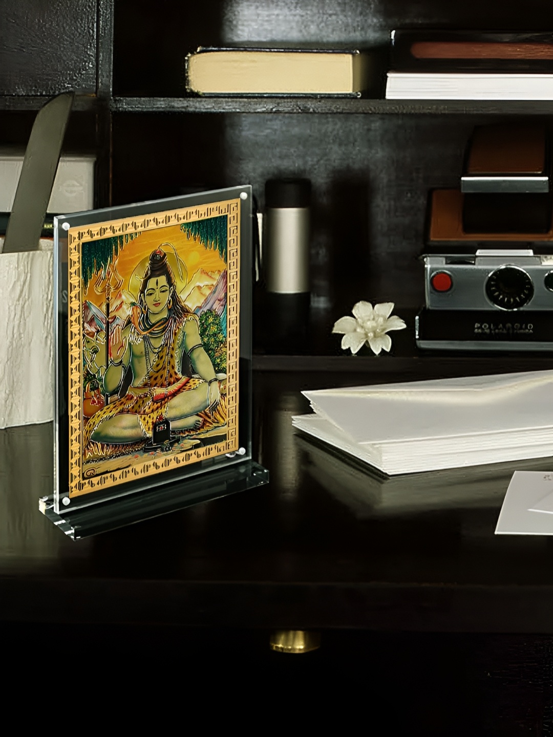 

Hawai Gold Toned & Transparent Lord Shiva Table Photo Frame