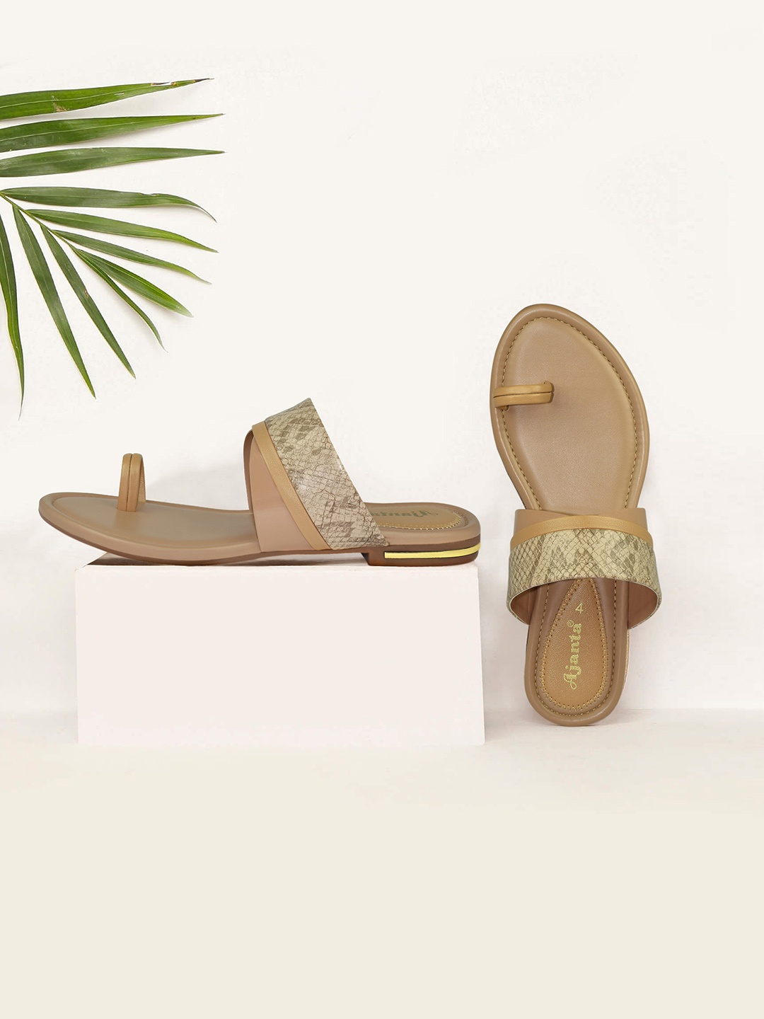 

Ajanta Women Printed Synthetic One Toe Flats, Beige