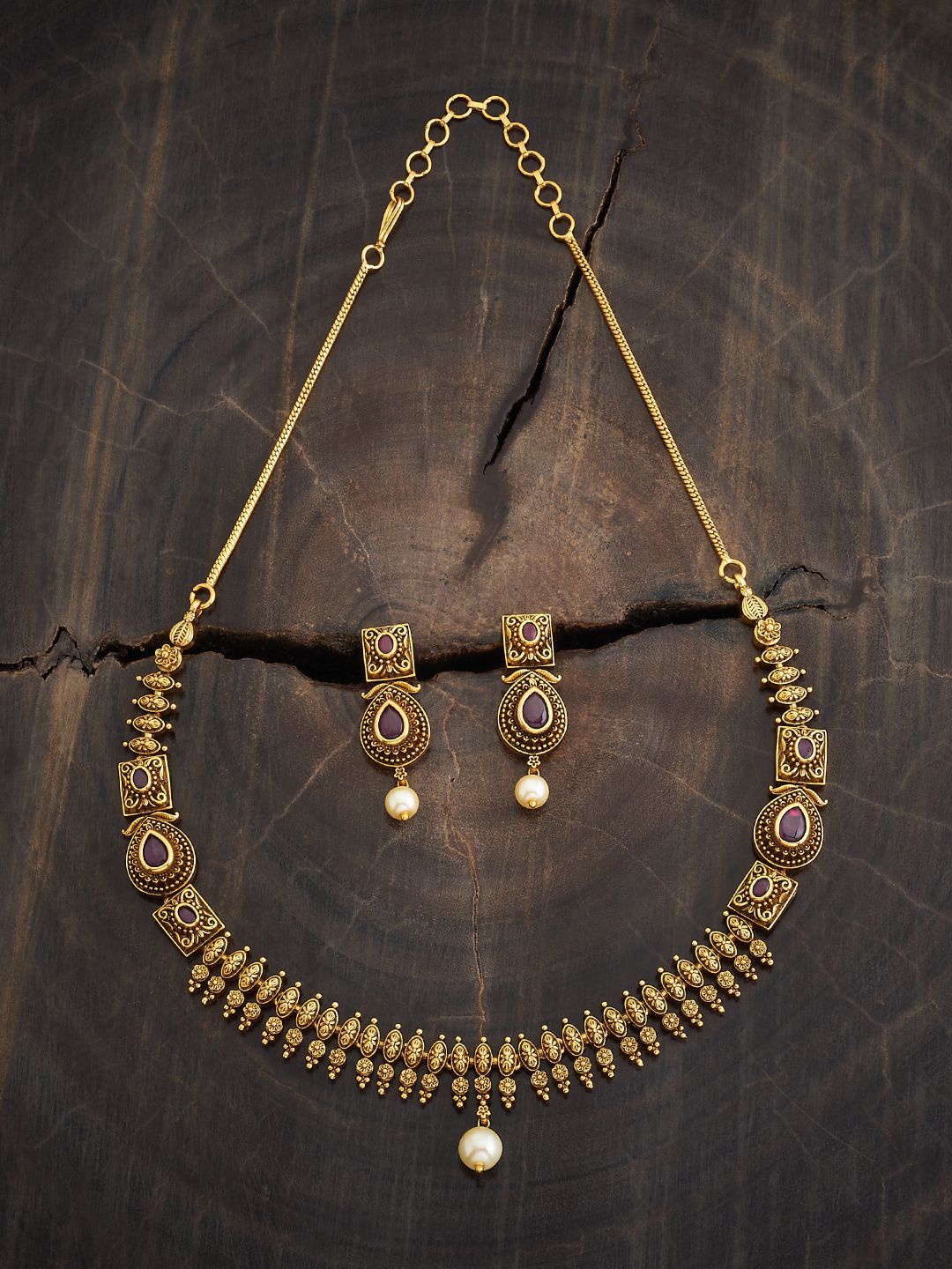 

Kushal's Fashion Jewellery Gold Plated Ruby Studded Antique Jewellery Set