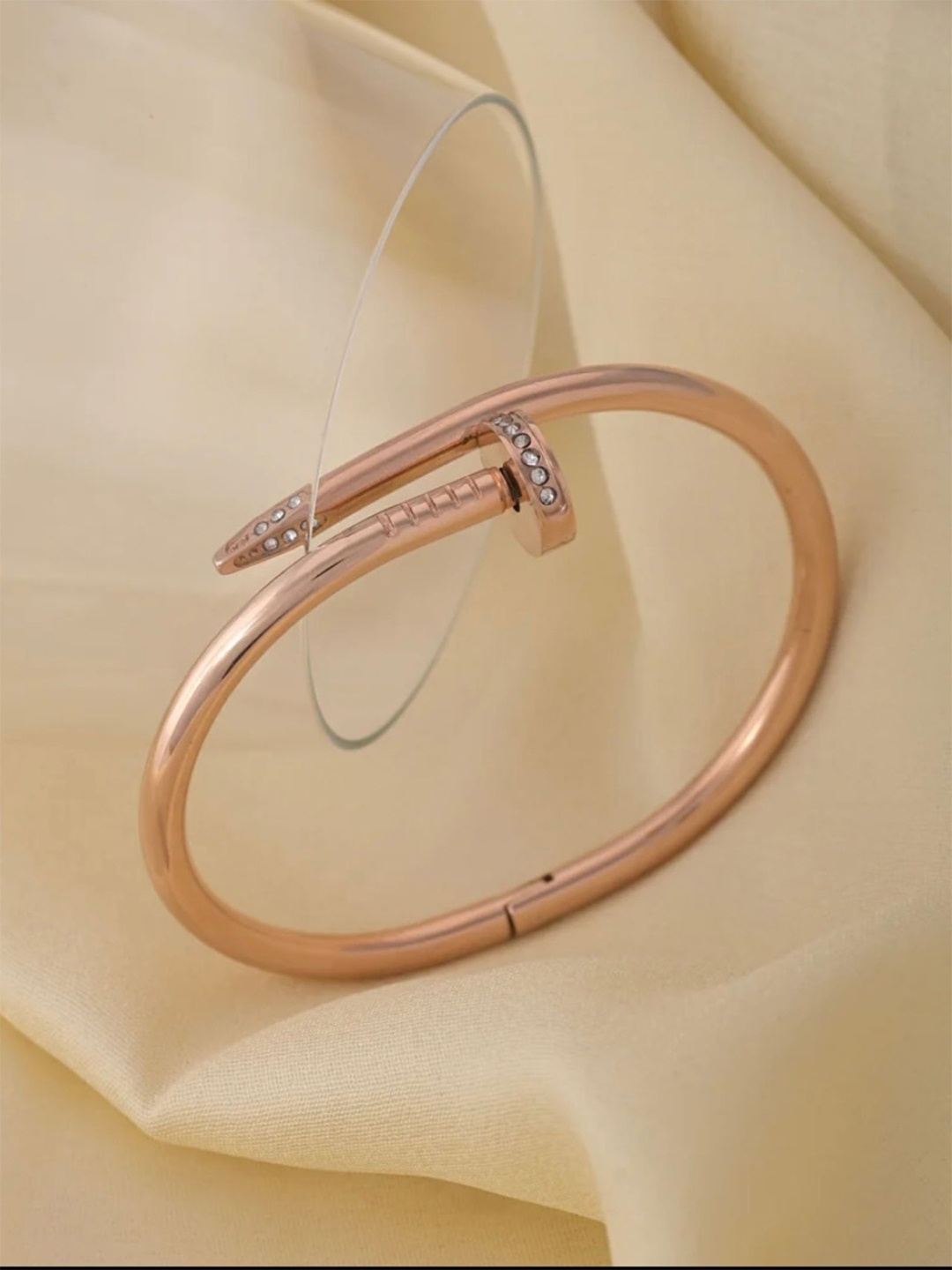 

The ivora Rose Gold-Plated Stainless Steel Cubic Zirconia Studded Cuff Bracelet