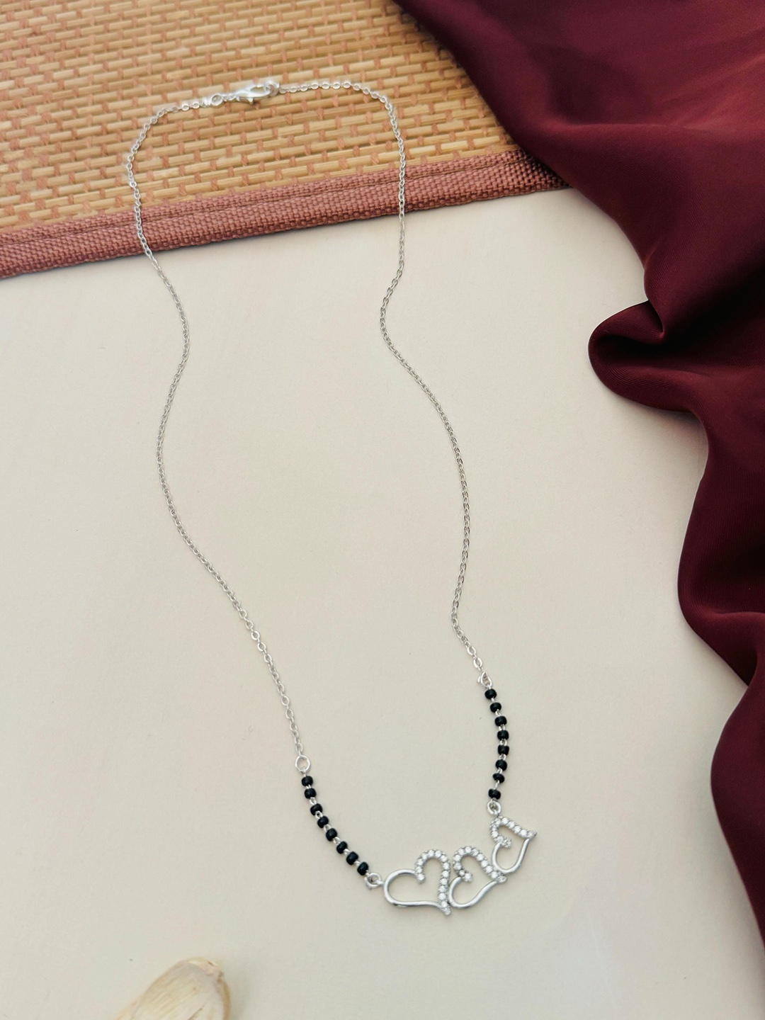 

Anouk Silver-Plated Artificial Stones and Beads Mangalsutra