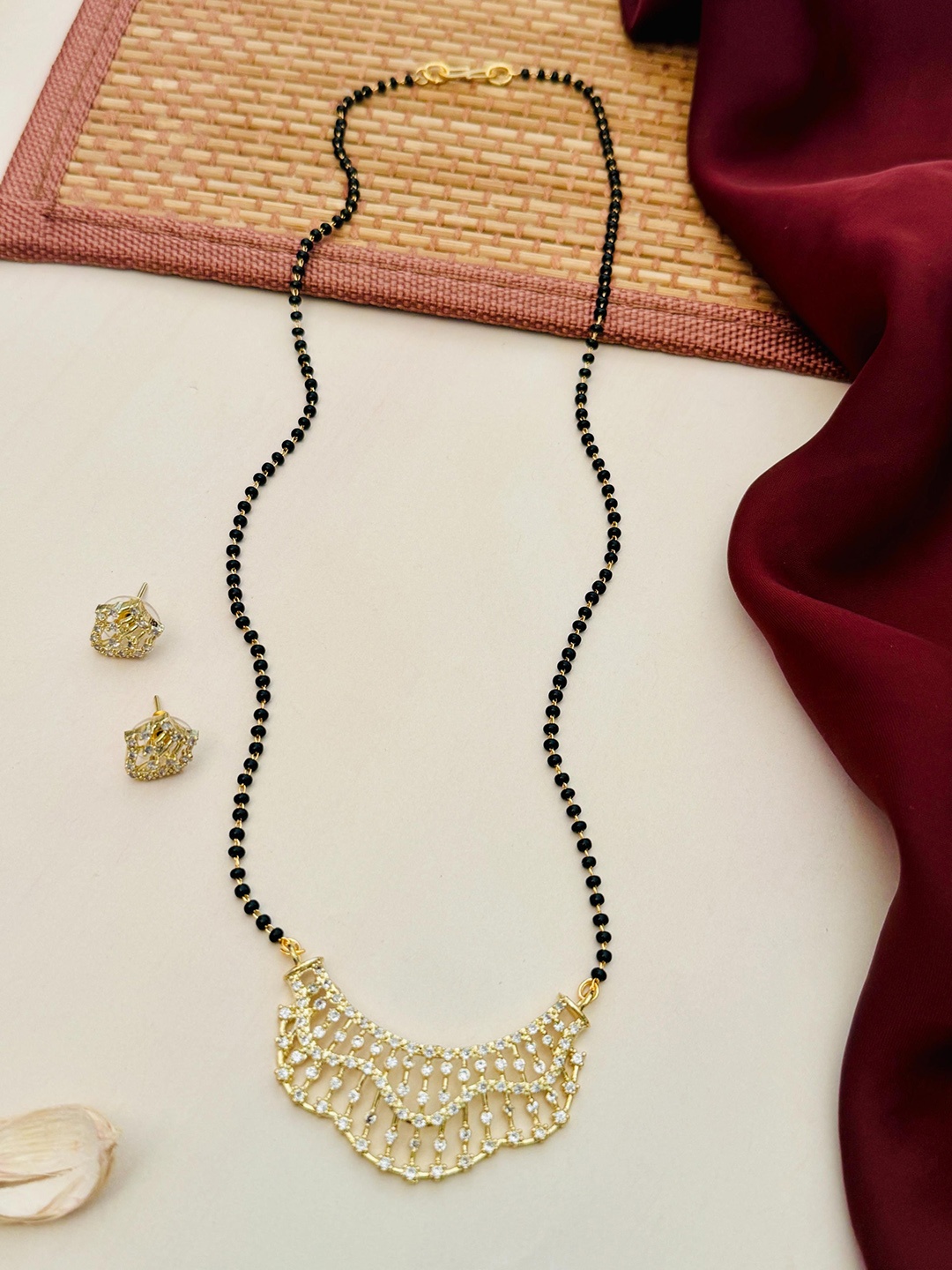 

Anouk Gold-Plated Artificial Stones and Beads Mangalsutra