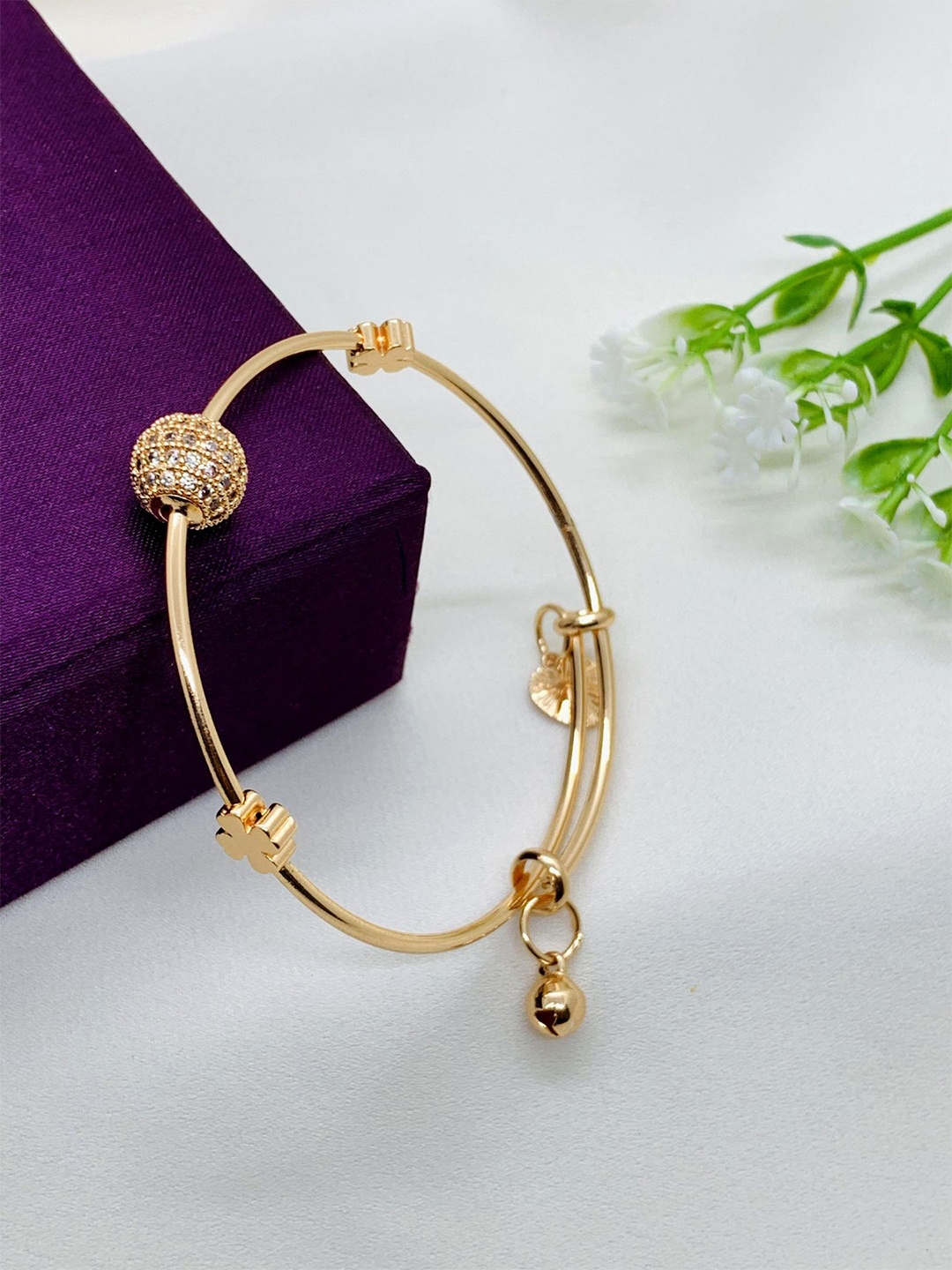 

The ivora Gold-Plated Stainless Steel Cubic Zirconia Studded Bangle-Style Bracelet