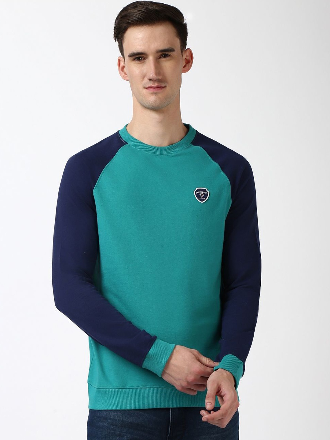 

Peter England Casuals Men Solid Round Neck Cotton Pullover Sweatshirt, Green