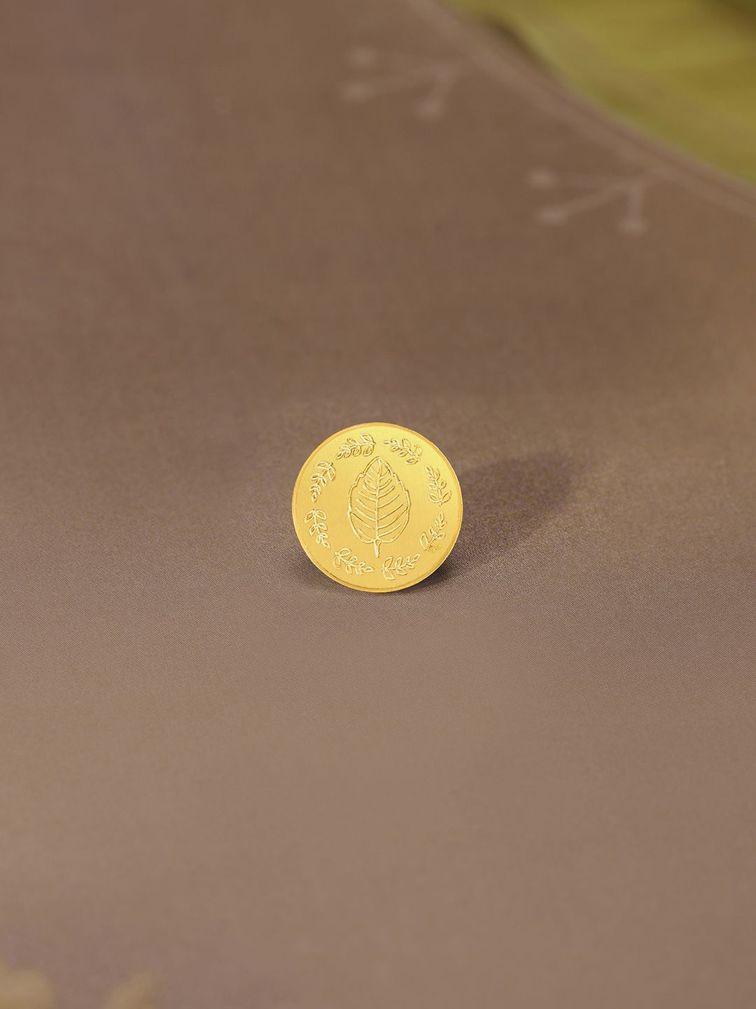 

Mia by Tanishq 24KT Gold Tulsi Leaf Gold Coin 0.5 g, Yellow