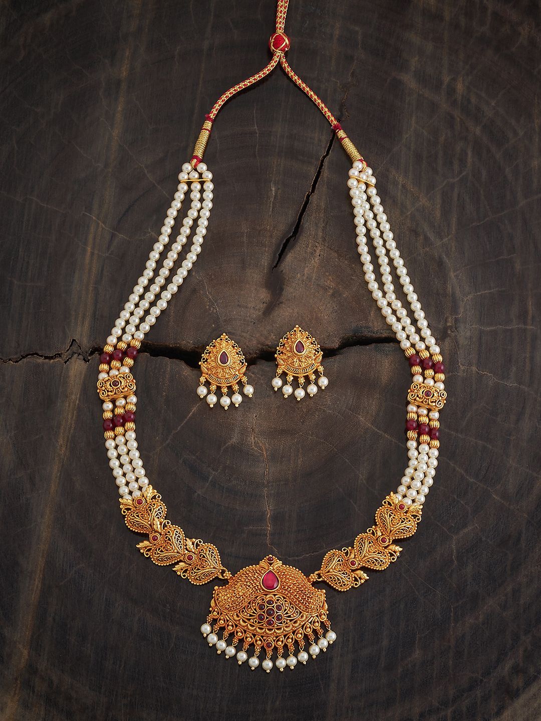 

Kushal's Fashion Jewellery Gold Plated Stones Studded & Beaded Antique Jewellery Set