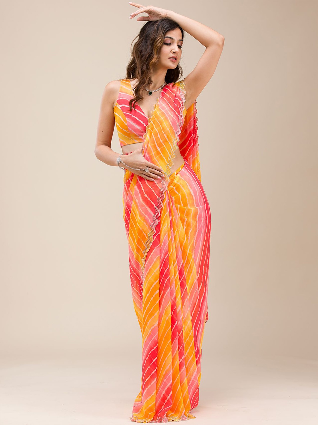 

Koskii Leheriya Beads and Stones Pure Georgette Saree, Yellow