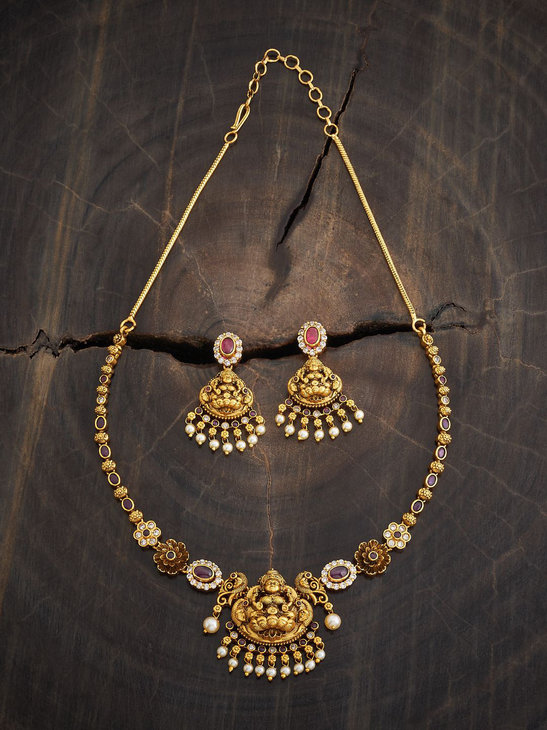 

Kushal's Fashion Jewellery Ruby Gold-Plated Stone Studded Antique Jewellery Set