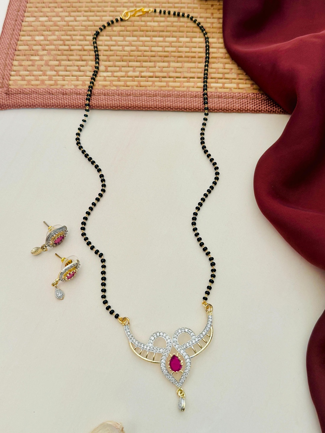 

Anouk Gold-Plated Artificial Stones and Beads Mangalsutra