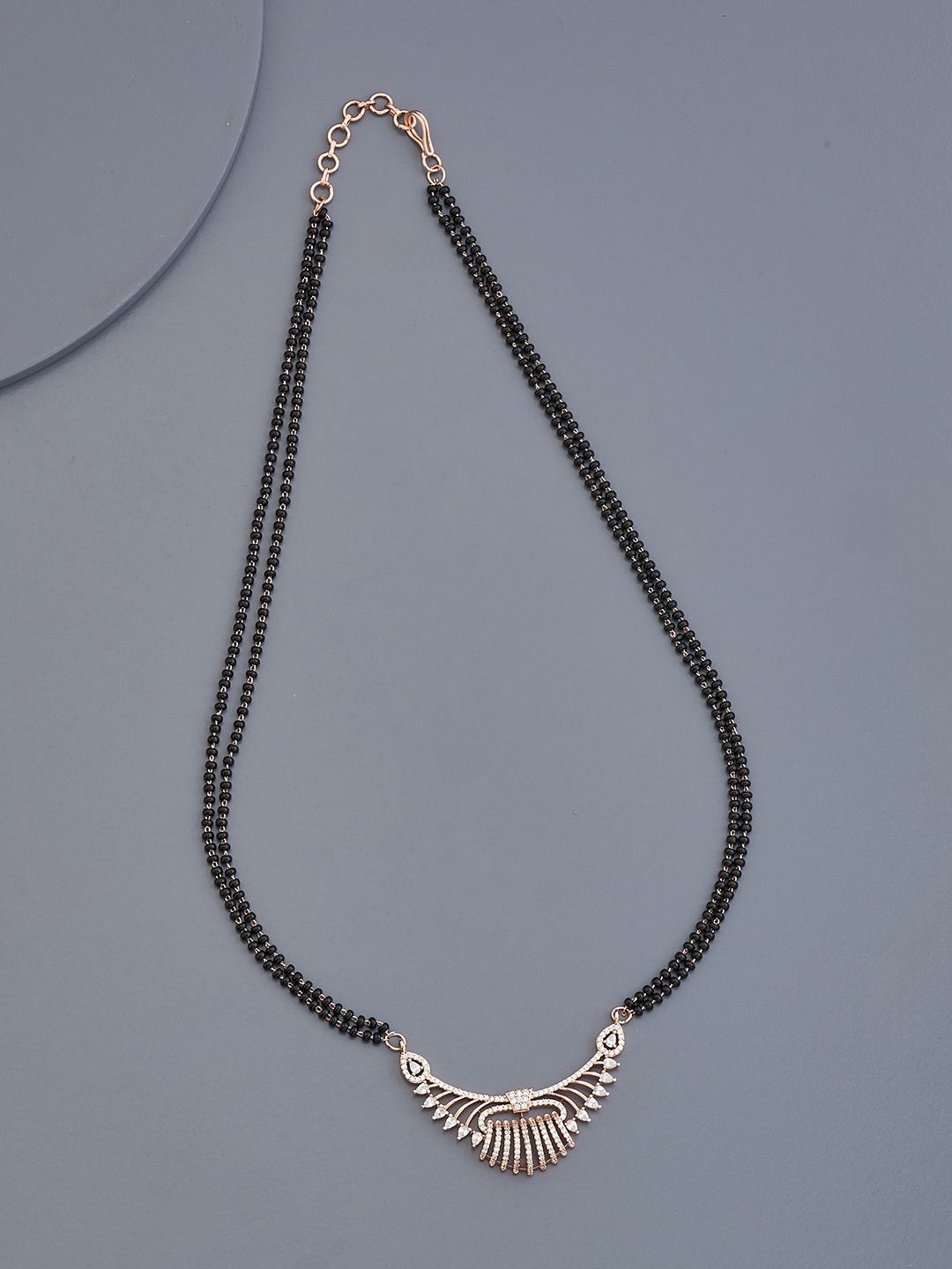 

Kushal's Fashion Jewellery Rose Gold Plated Zircon Studded Mangalsutra
