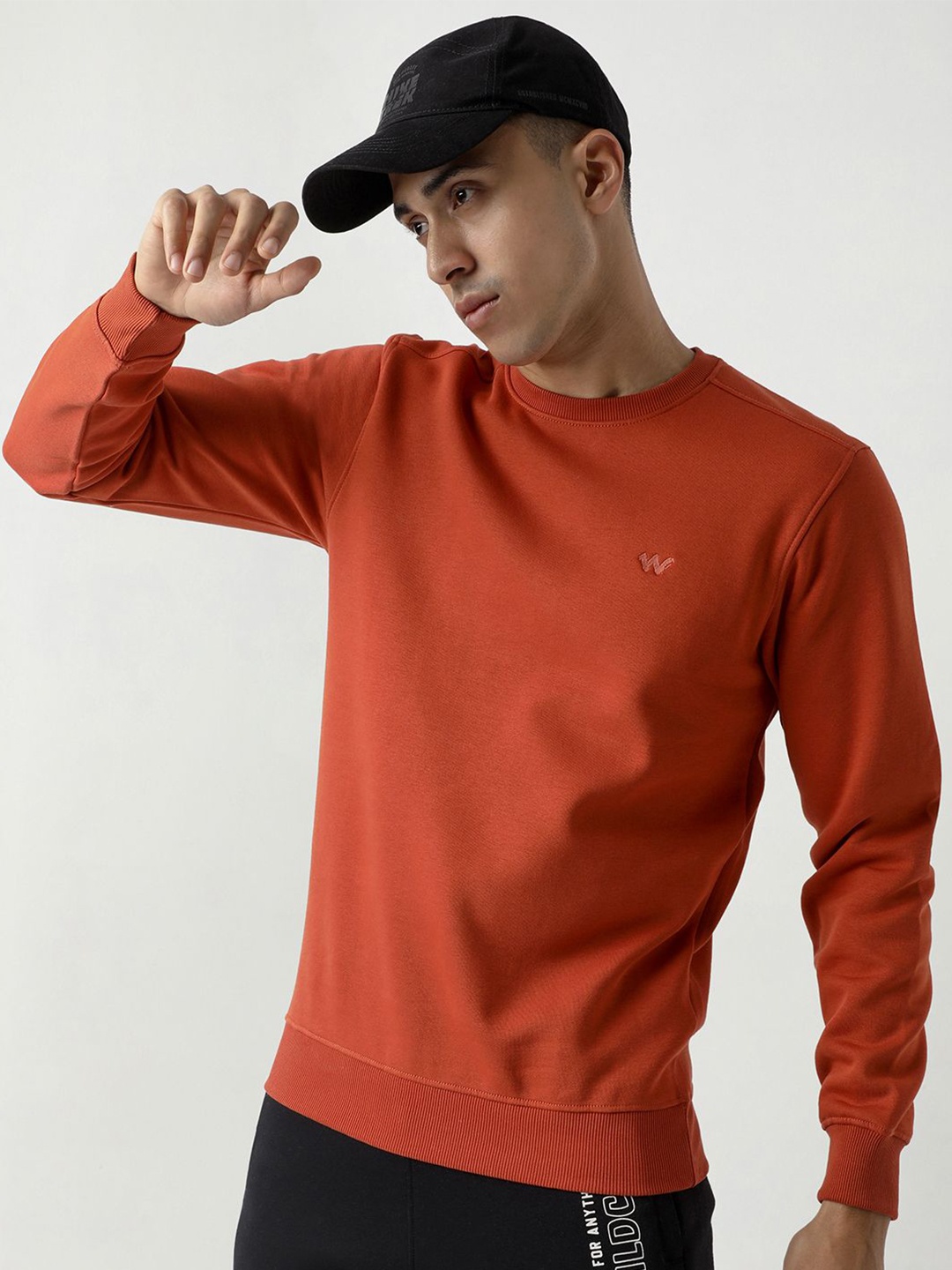 

Wildcraft Men Solid Round Neck Cotton Pullover Sweatshirt, Orange