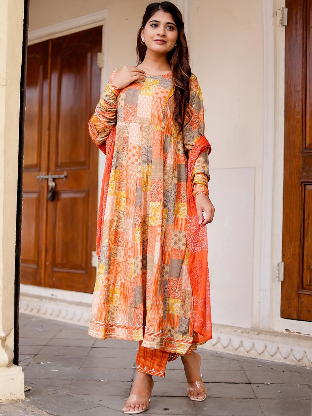 

Chandbaali Women Printed Regular Pure Cotton Kurta with Palazzos & With Dupatta, Orange