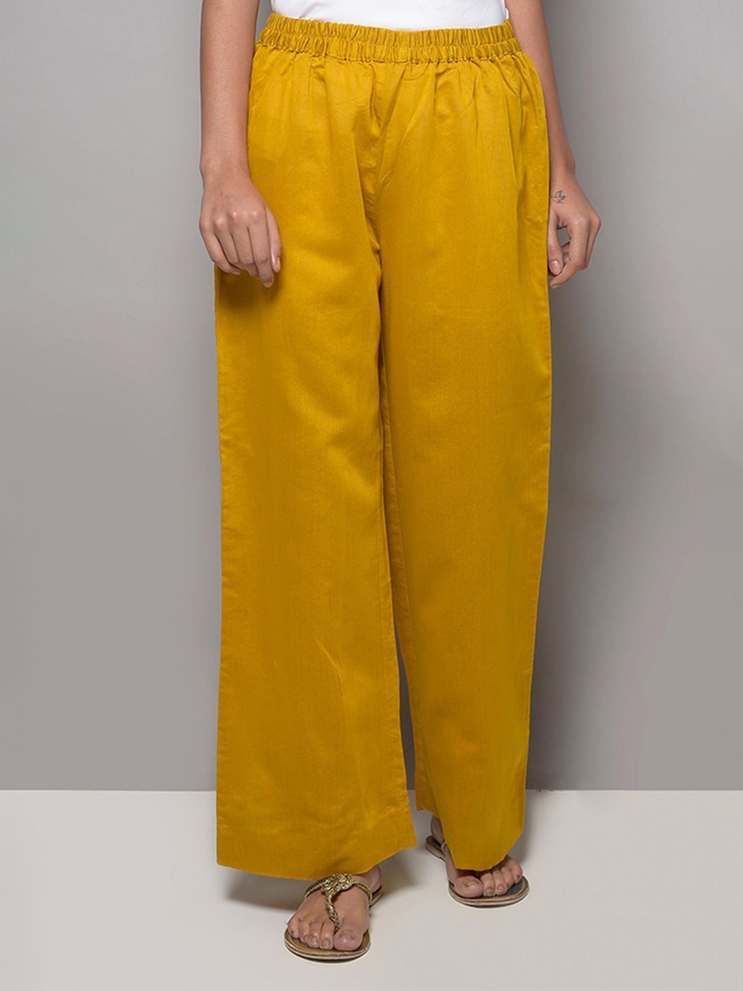 

KHUSHBOO AND PANKAJ Women Flared Handloom Palazzos, Mustard