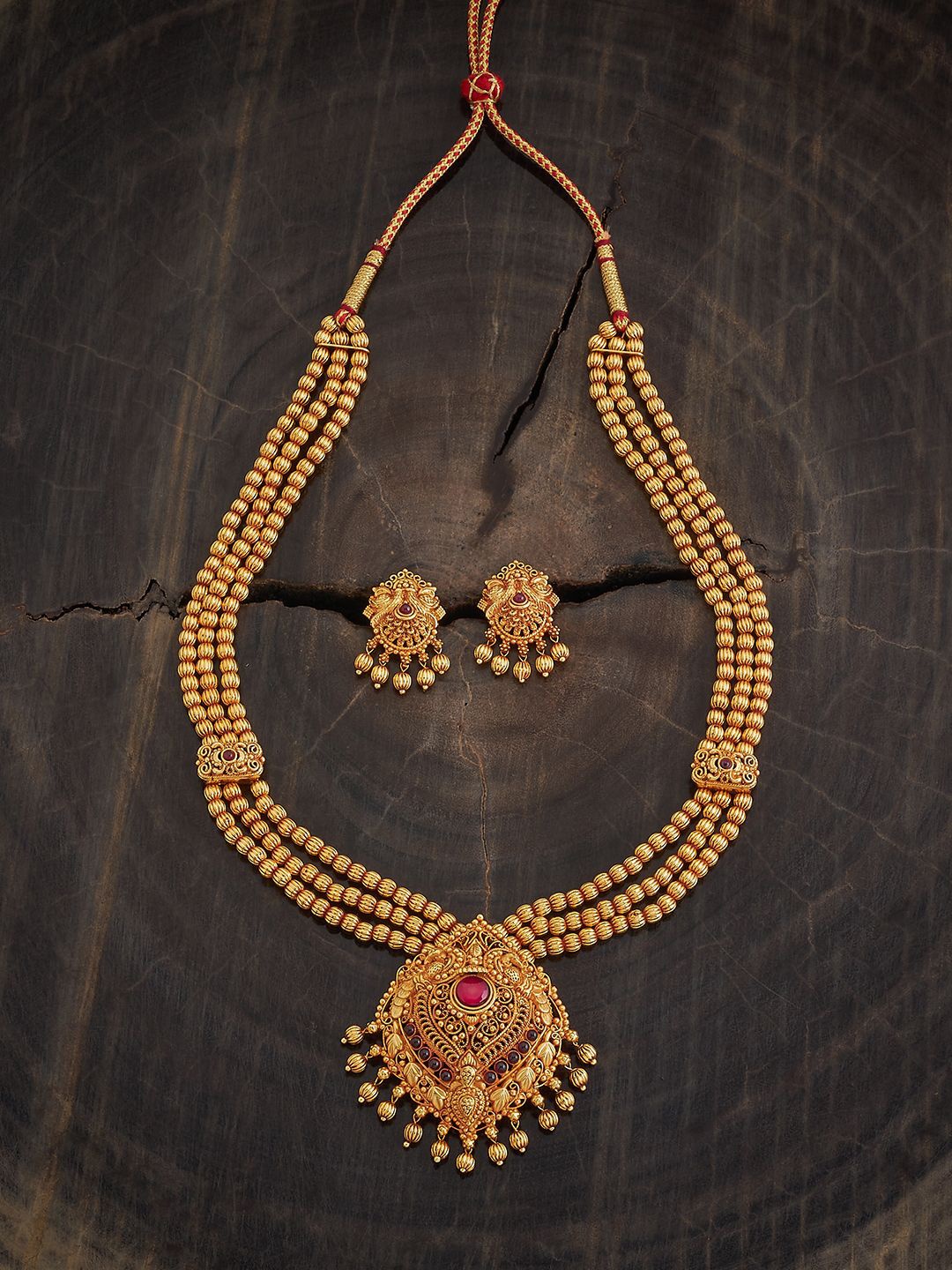 

Kushal's Fashion Jewellery Ruby Gold-Plated Artificial Stone-Studded Jewellery Set