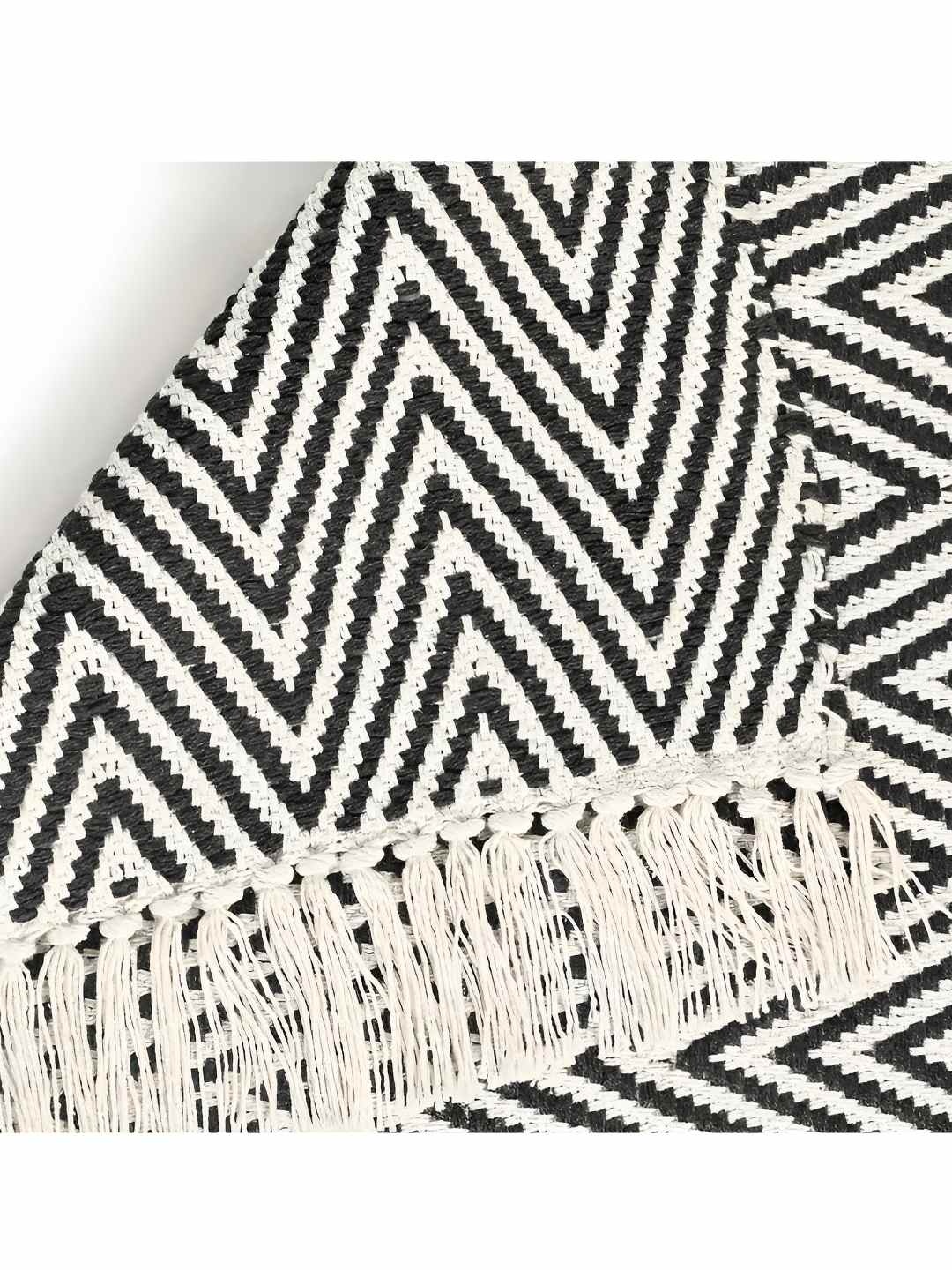 

SASHAA WORLD Black & White Printed Cotton Reversible Rug with Tassels