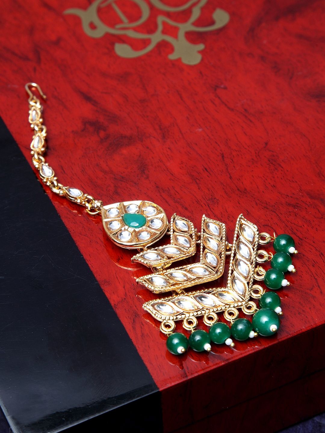 

Anouk Gold-Plated Kundan Studded Maang Tikka Head Jewellery