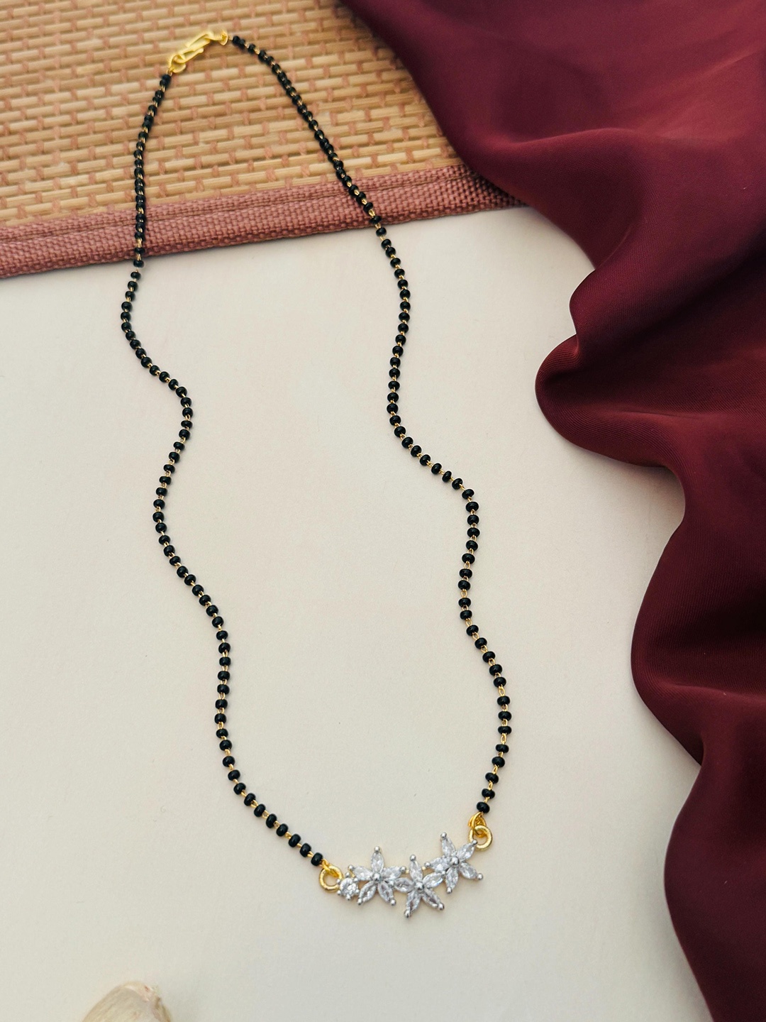 

Anouk Gold-Plated Artificial Stones and Beads Mangalsutra