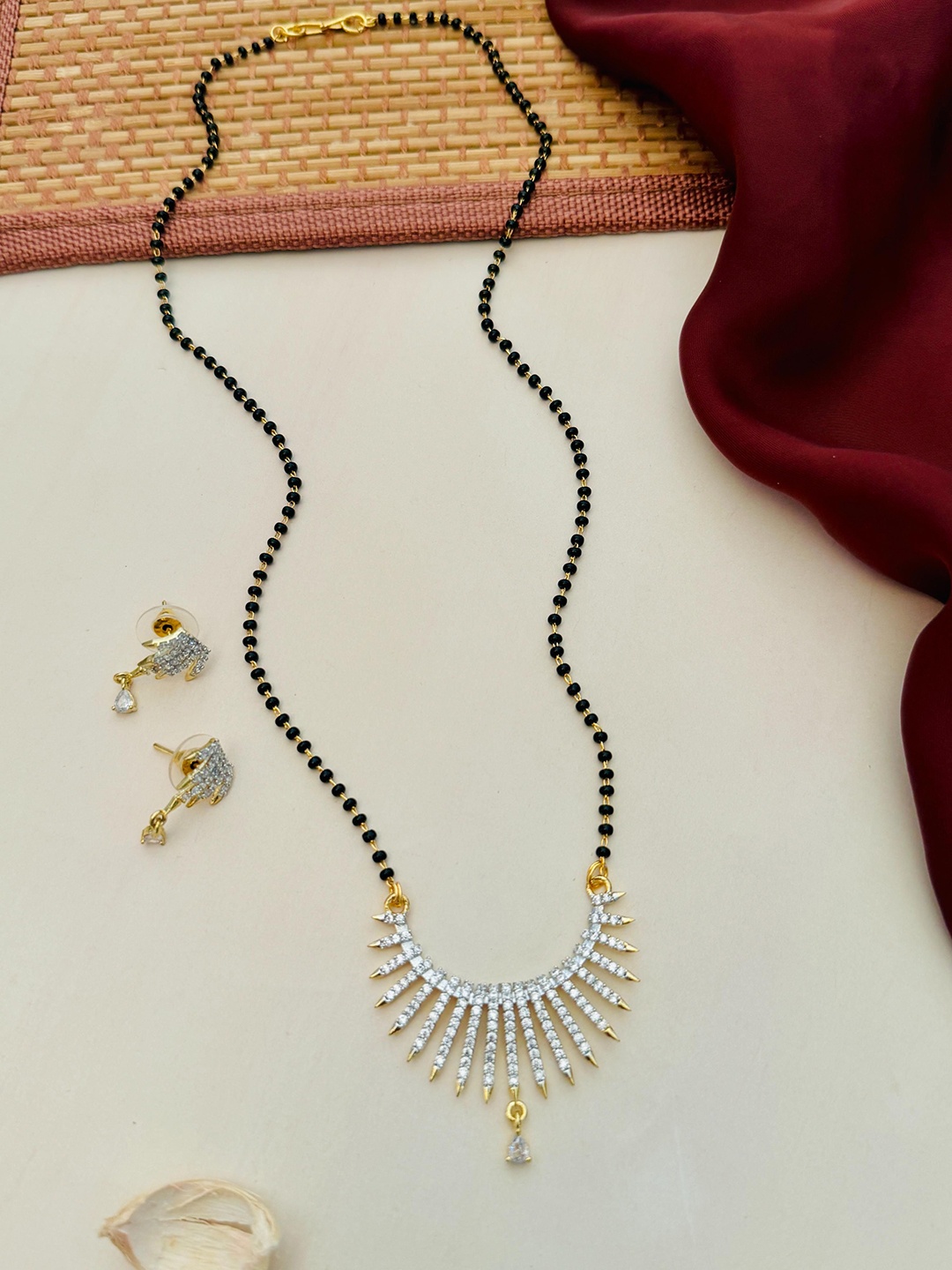 

Anouk Gold-Plated Artificial Stones and Beads Mangalsutra