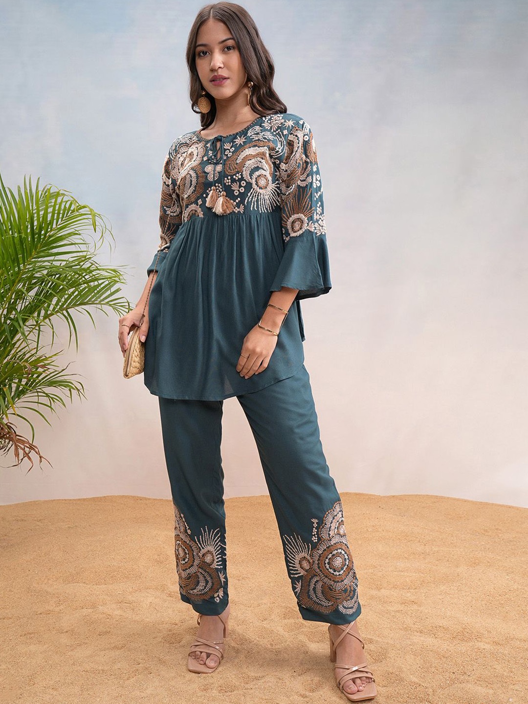 

Vishudh Floral Embroidered Tie Up Neck Bell Sleeves Top With Trouser, Blue