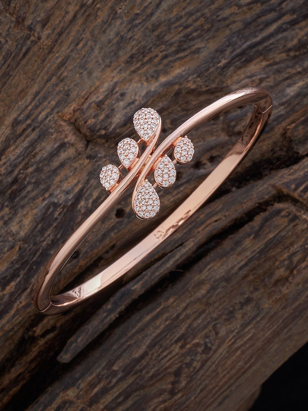 

Kushal's Fashion Jewellery Women Cubic Zirconia Rose Gold-Plated Kada Bracelet