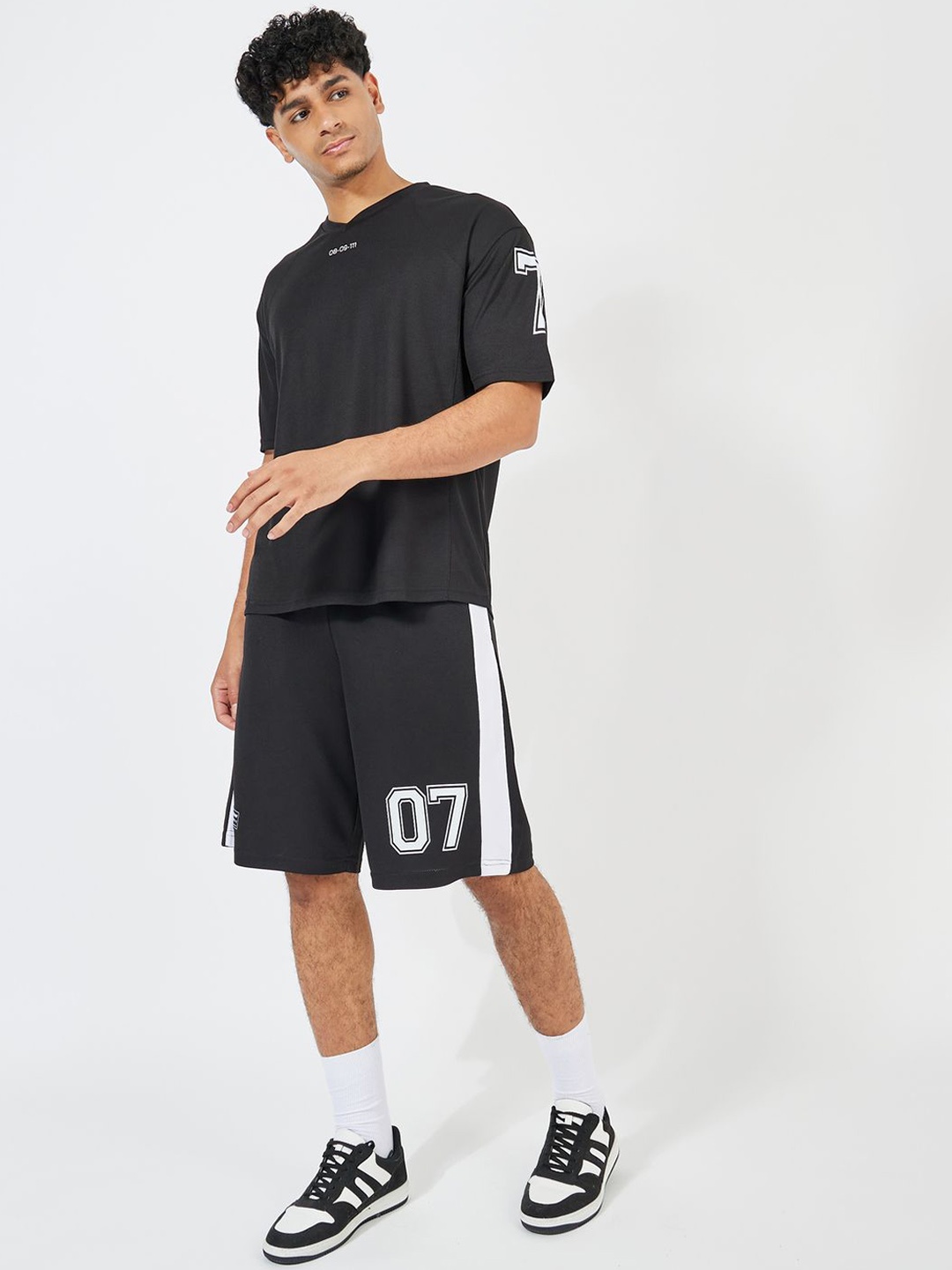 

Styli Black Varsity Printed Oversized T-shirt & Shorts