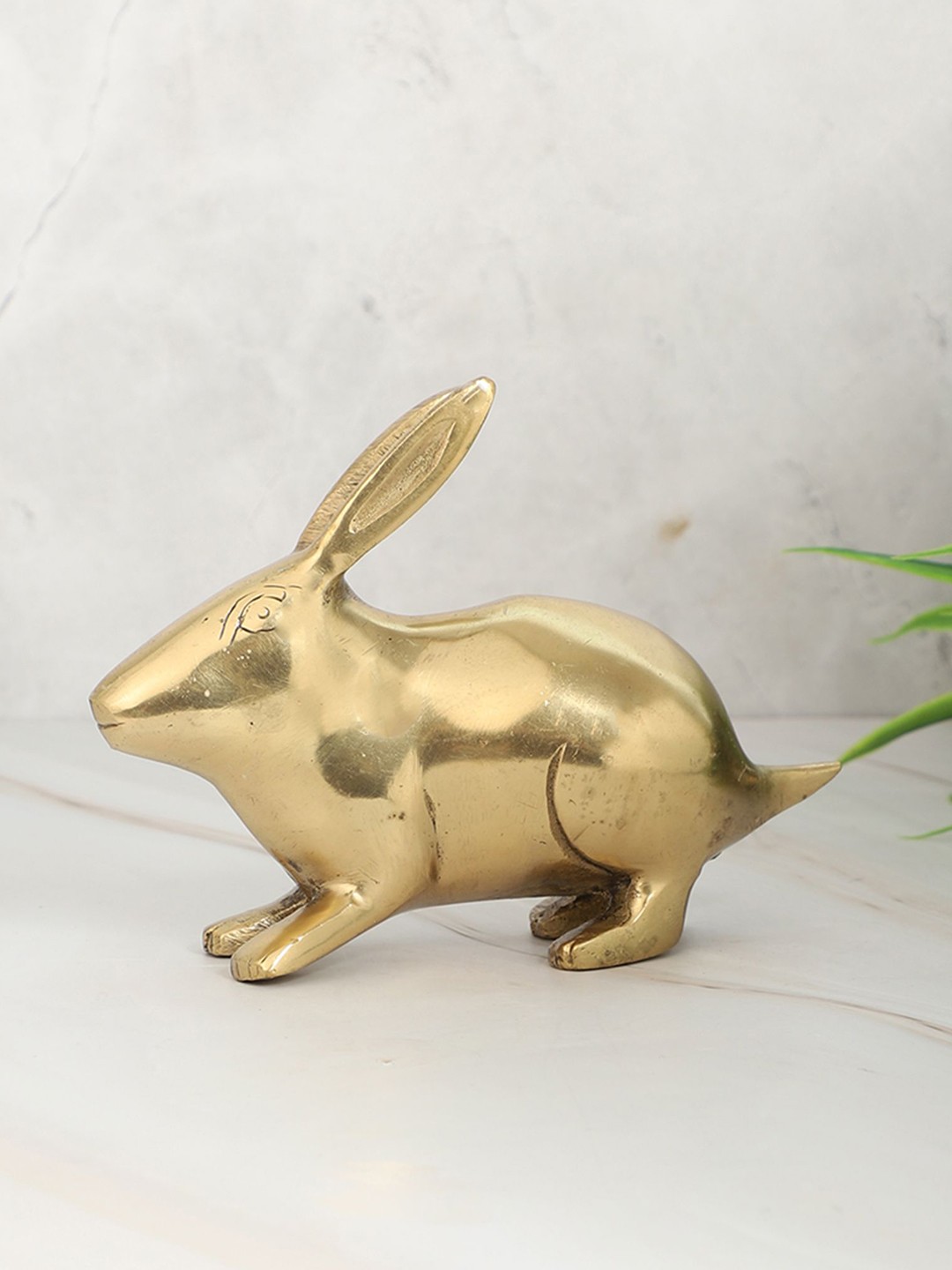 

Two Moustaches Gold-Toned Figurine Showpiece