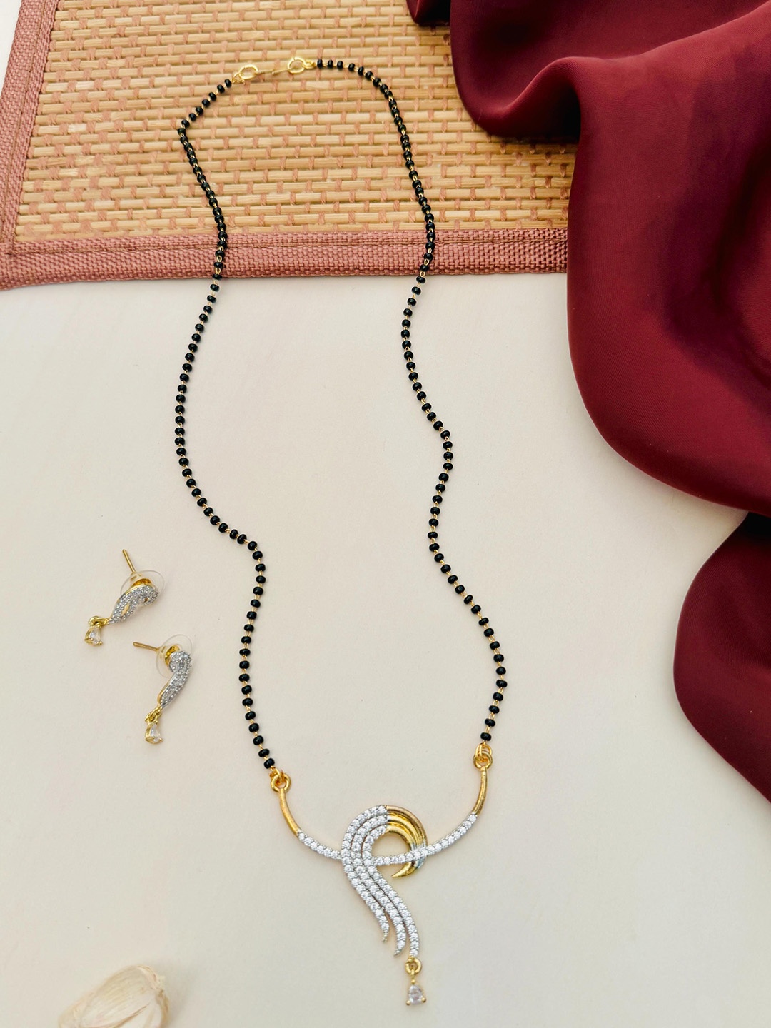 

Anouk Gold-Plated Artificial Stones and Beads Mangalsutra