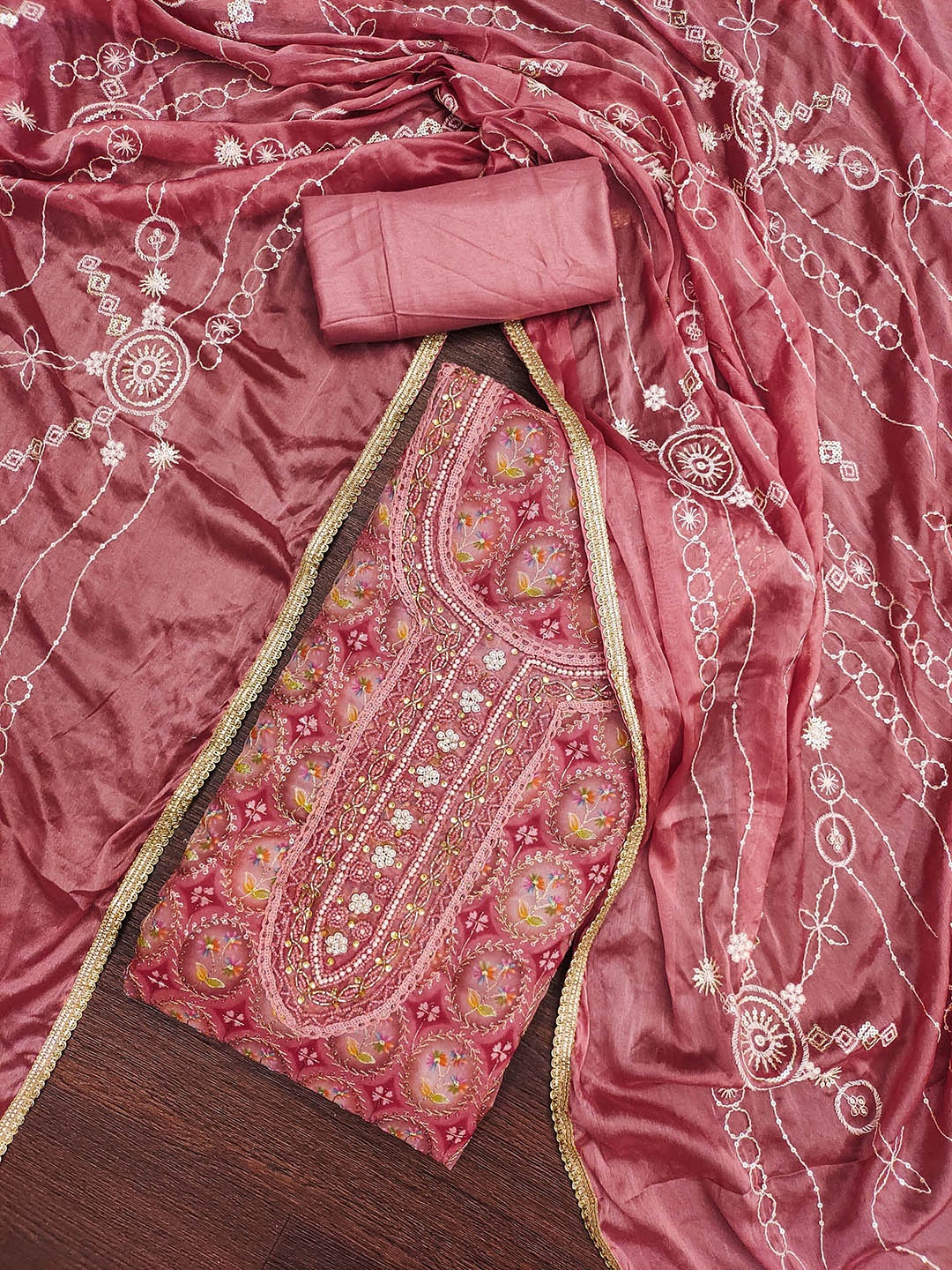 

Maroosh Floral Embroidered Beads and Stones Organza Unstitched Dress Material, Rust