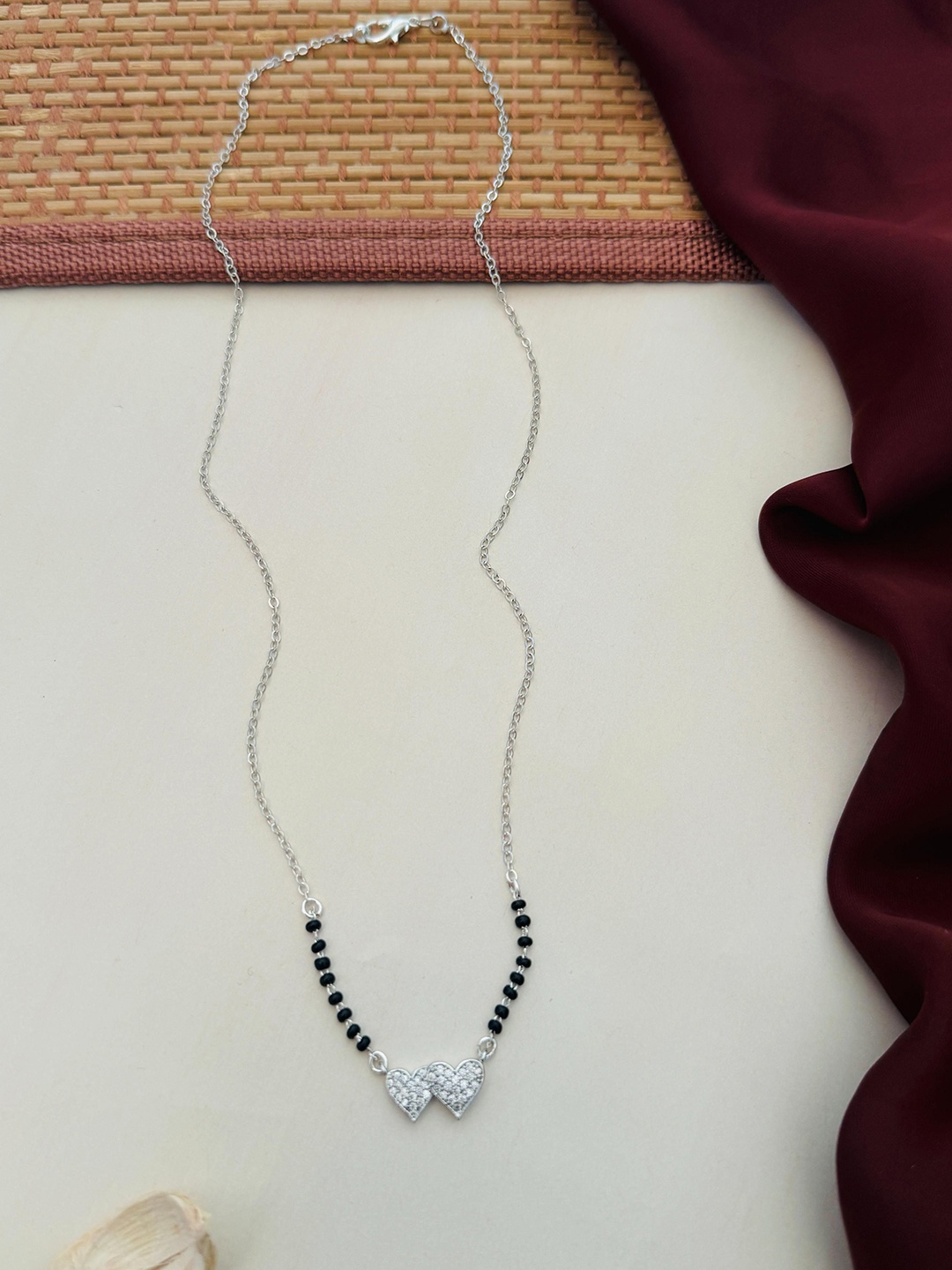 

Anouk Silver-Plated Artificial Stones and Beads Mangalsutra