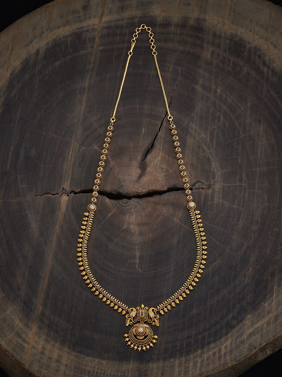 

Kushal's Fashion Jewellery Gold-Plated Stone Studded Antique Necklace