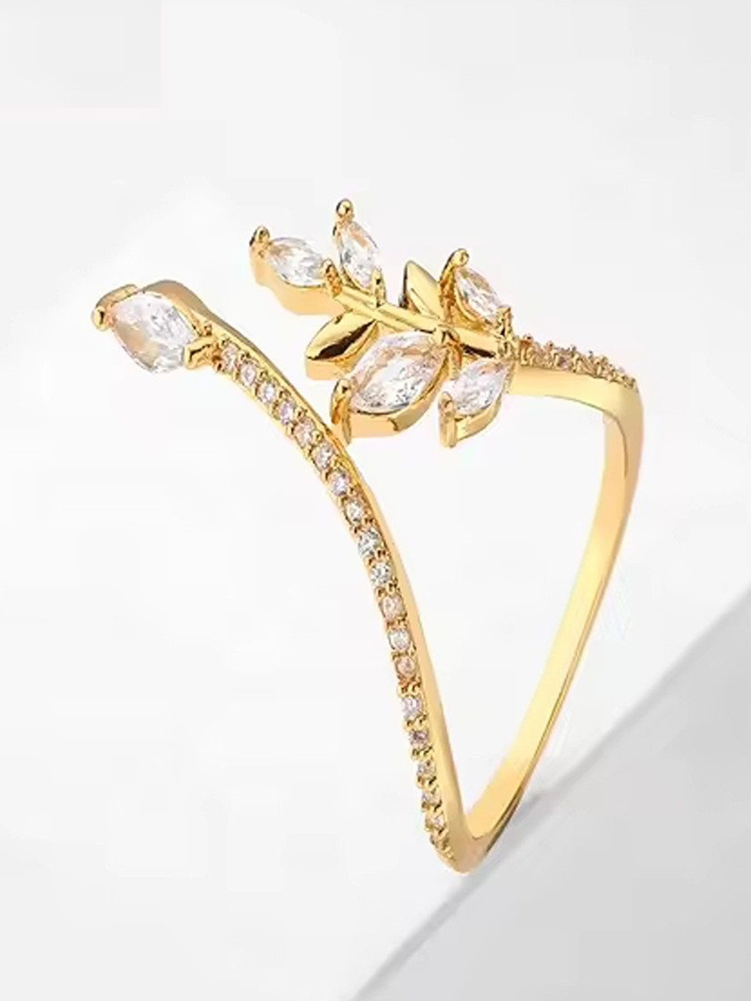 

Heer Collection Gold-Plated Leaf-Shaped Cubic Zirconia Studded Finger Ring