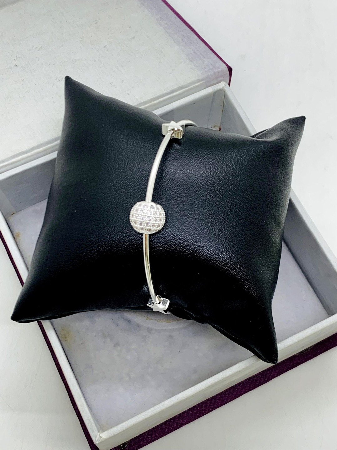 

The ivora Silver-Plated Stainless Steel Cubic Zirconia Studded Bangle-Style Bracelet