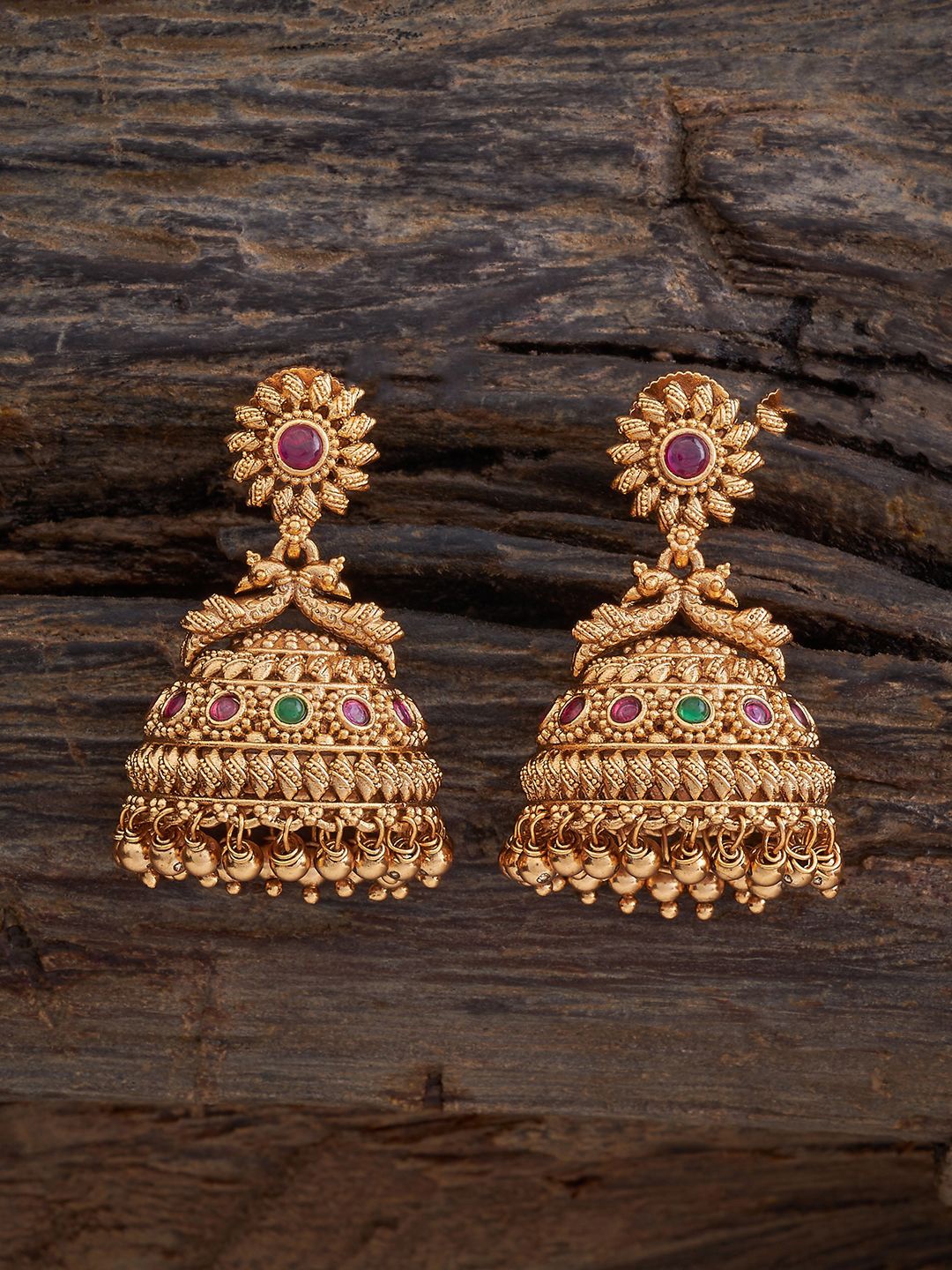 

Kushal's Fashion Jewellery Gold Plated Stone Studded Dome Shaped Antique Jhumkas