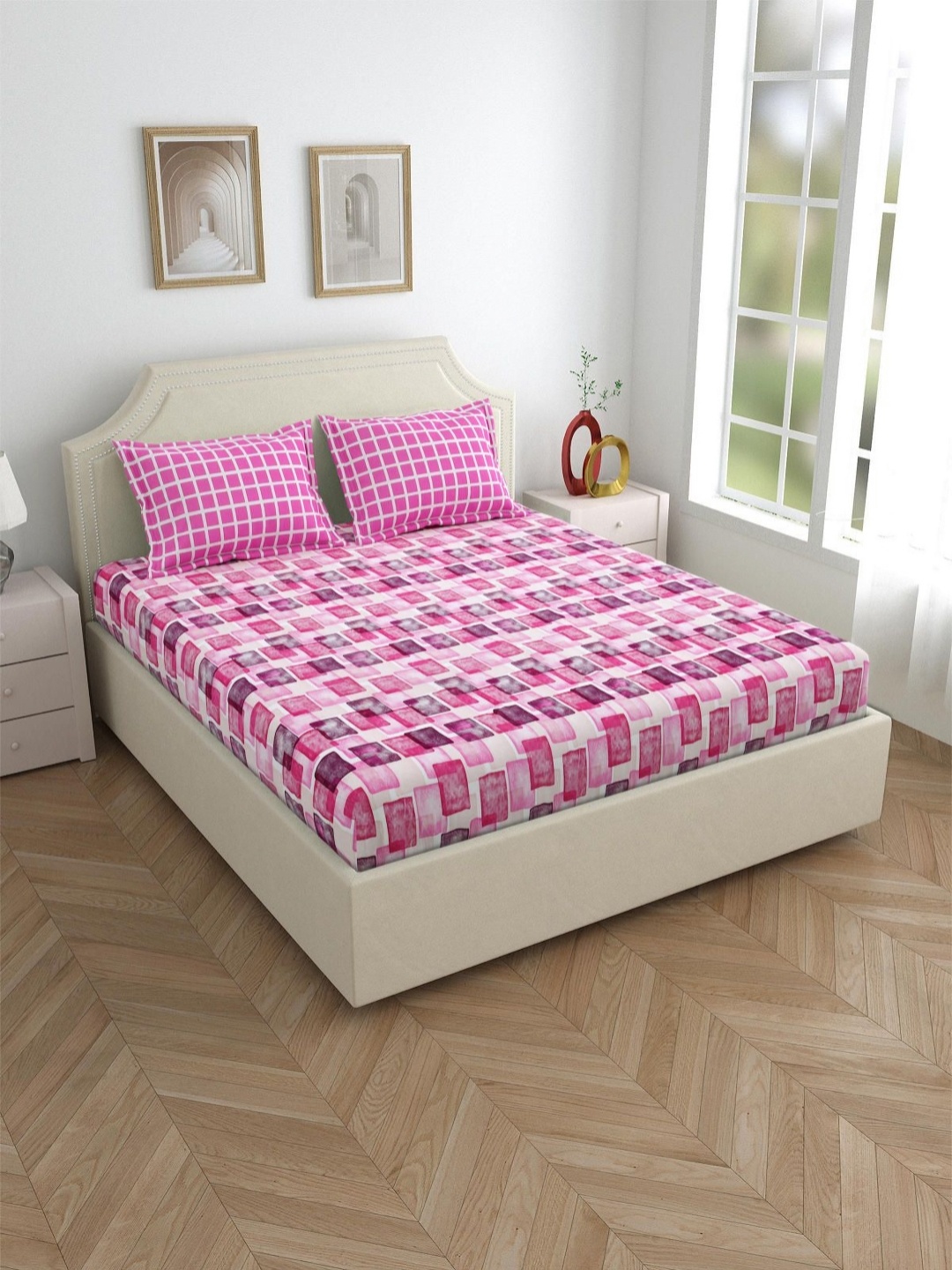 

Salona Bichona Pink & White Geometric 180 TC King Bedsheet with 2 Pillow Covers