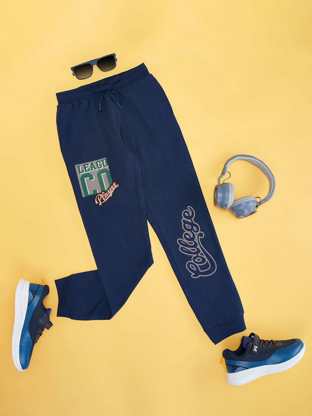 

Pantaloons Junior Boys Printed Pure Cotton Slim-Fit Mid-Rise Joggers, Navy blue