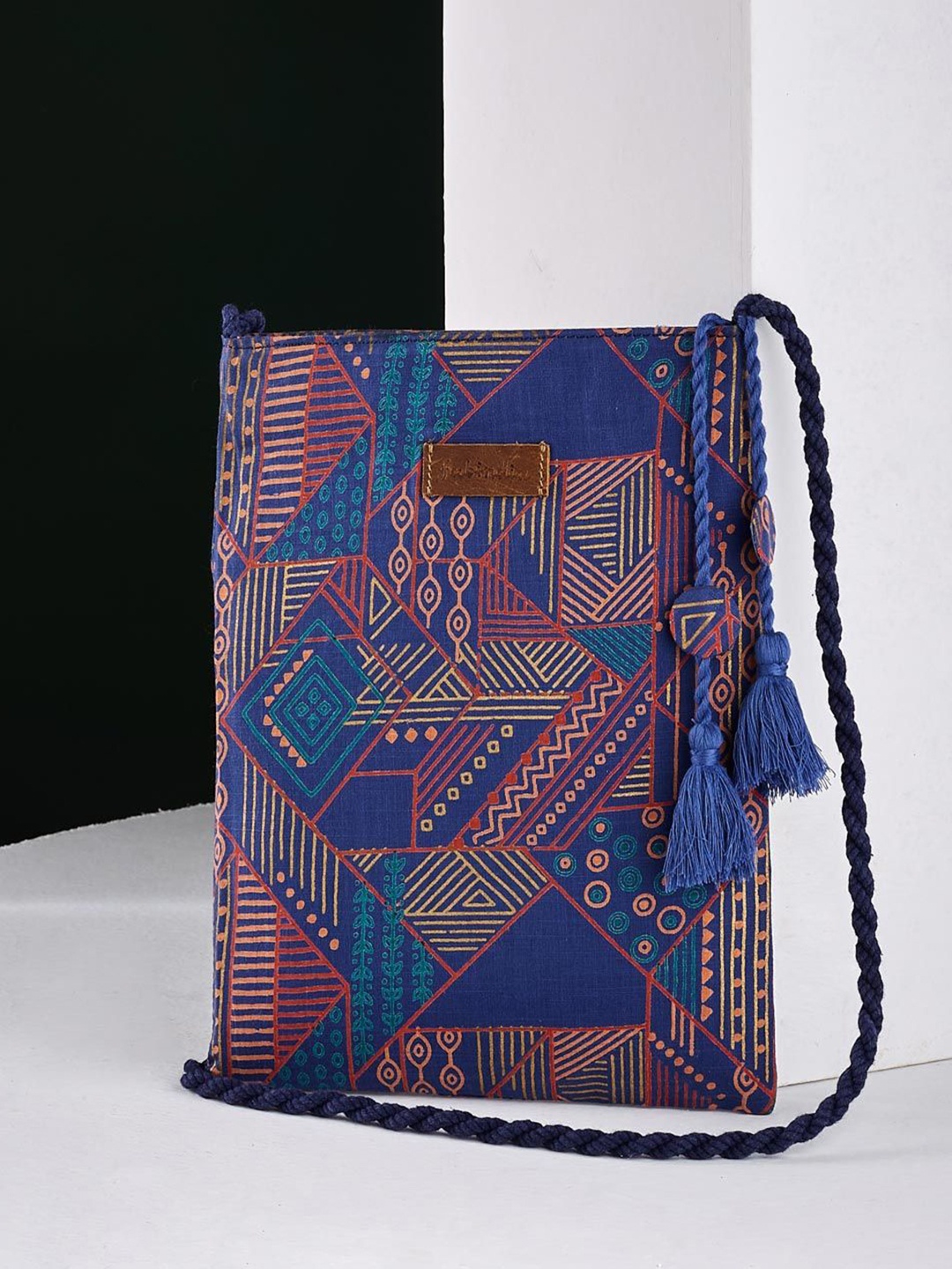 

Fabindia Printed Structured Sling Bag with Tasselled, Blue