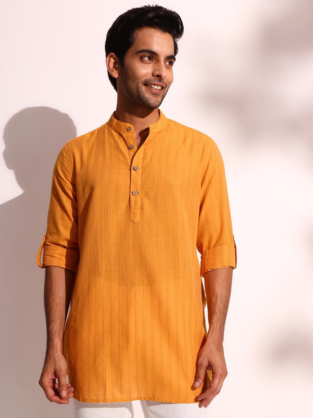 

Fabindia Striped Mandarin Collar Roll-Up Sleeves Cotton Dobby Short Straight Kurta, Yellow