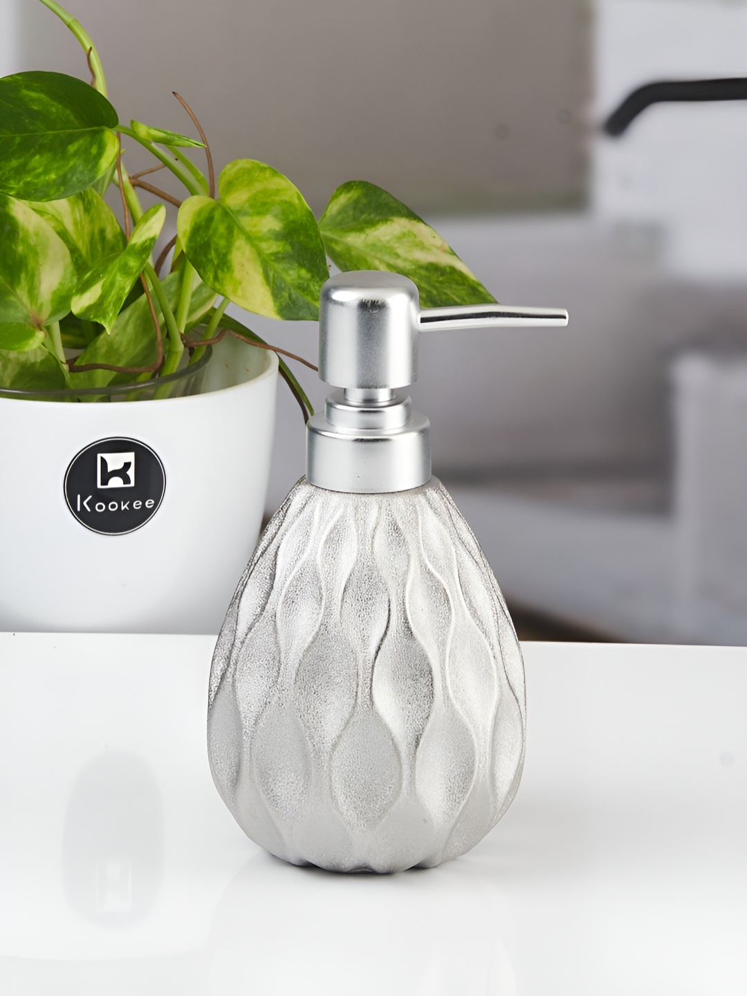 

Kookee Silver-Toned Abstract Ceramic Soap Dispenser