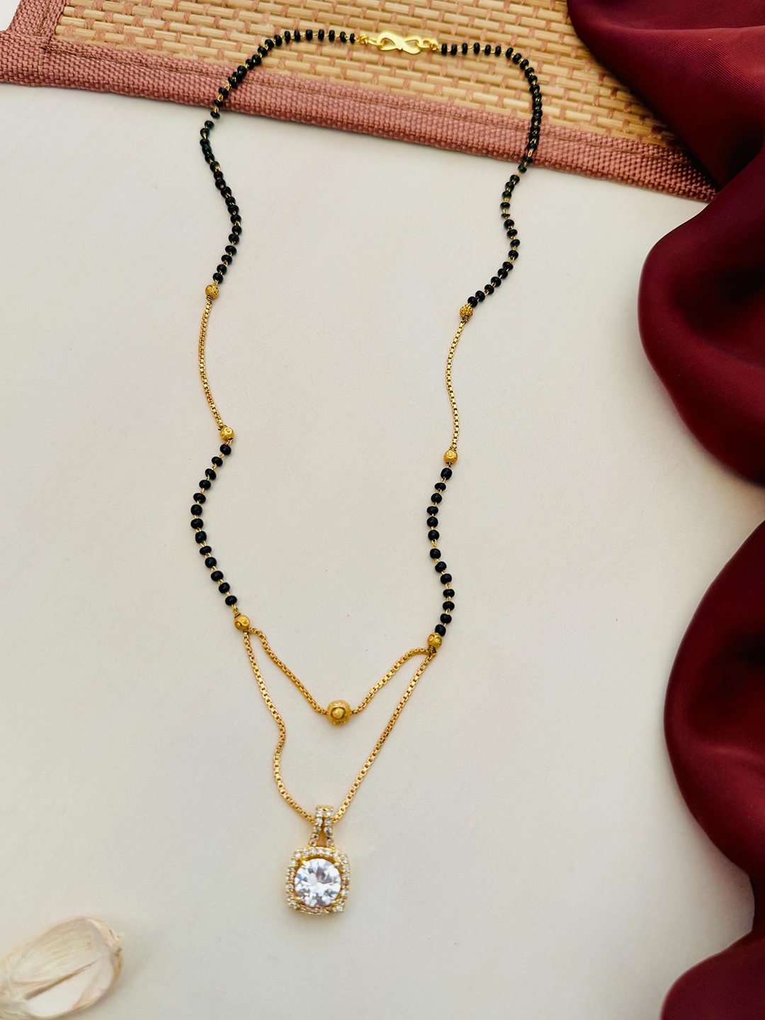 

Anouk Gold-Plated Artificial Stones and Beads Mangalsutra