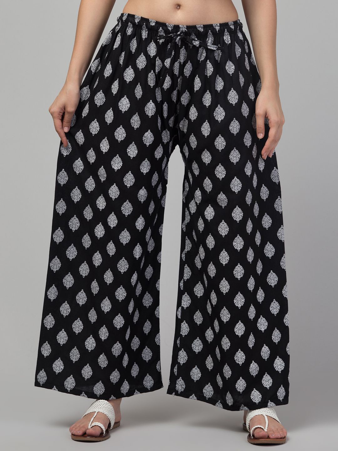 

FAMBEE Women Printed Flared Knitted Palazzos, Black