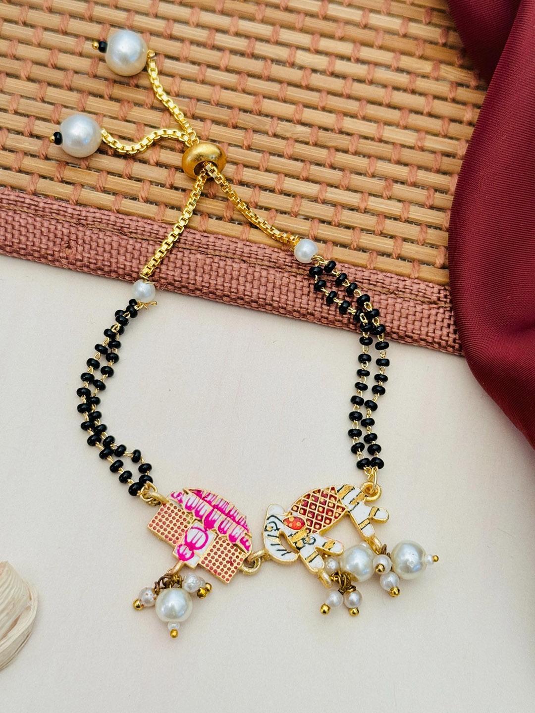 

Anouk Gold-Plated Artificial Stones and Beads Mangalsutra