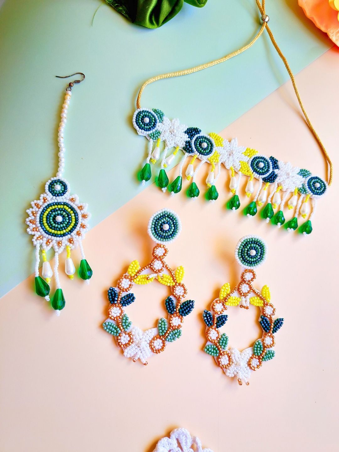 

Sangria Green Gold-Plated Stone Studded & Floral Beaded Boho Jewellery Set