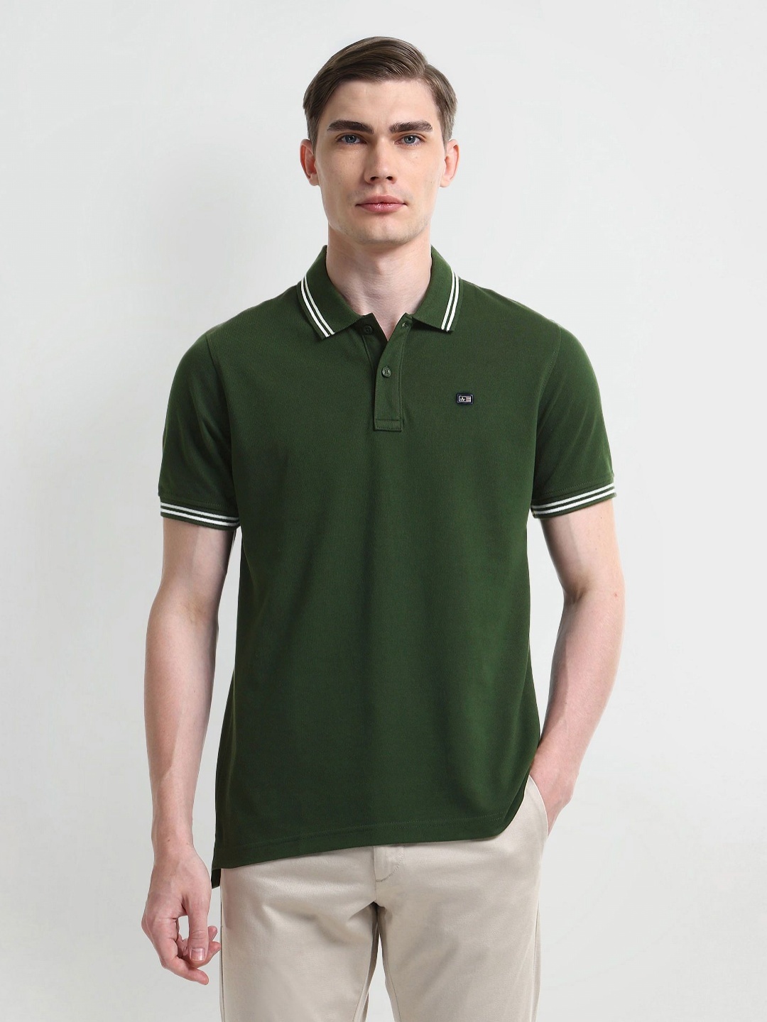 

Arrow Sport Men Solid Polo Collar Cotton T-shirt, Green