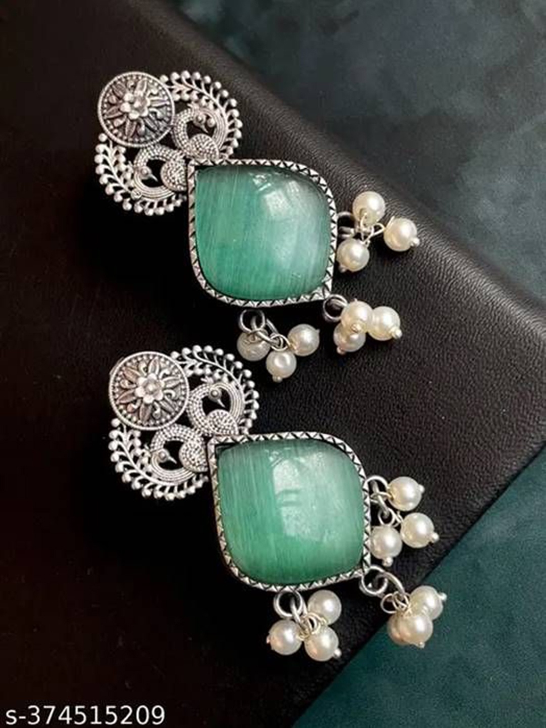 

The Pari Silver Plated Artificial Stones and Beads Oxidised Drop Earrings