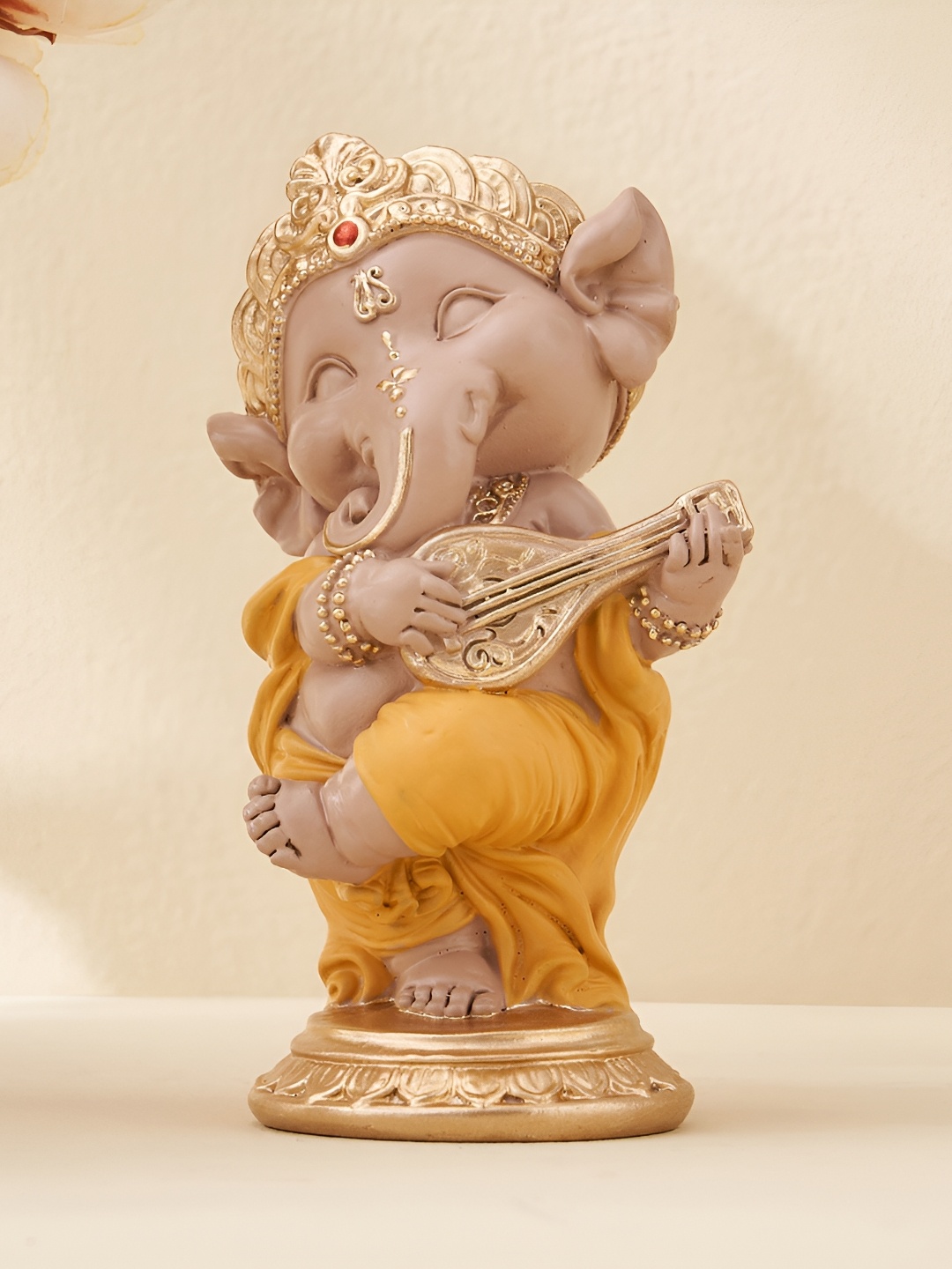

Home Centre Corsica Yellow & Gold-Toned Religious Idol Showpiece