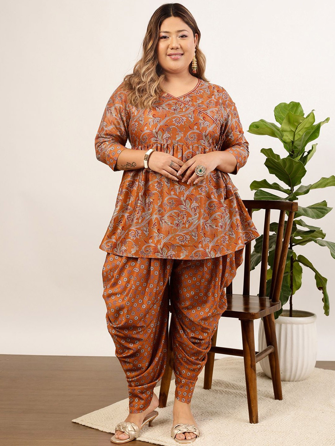 

indo street Women Floral Printed Angrakha Sequinned Kurti with Dhoti Pants, Rust